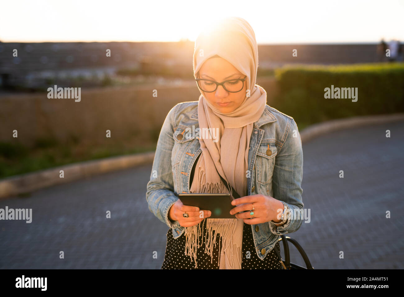 Young woman using digital tablet Stock Photo
