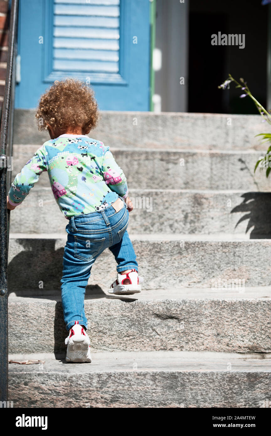 Girl walking up stairs hires stock photography and images Alamy