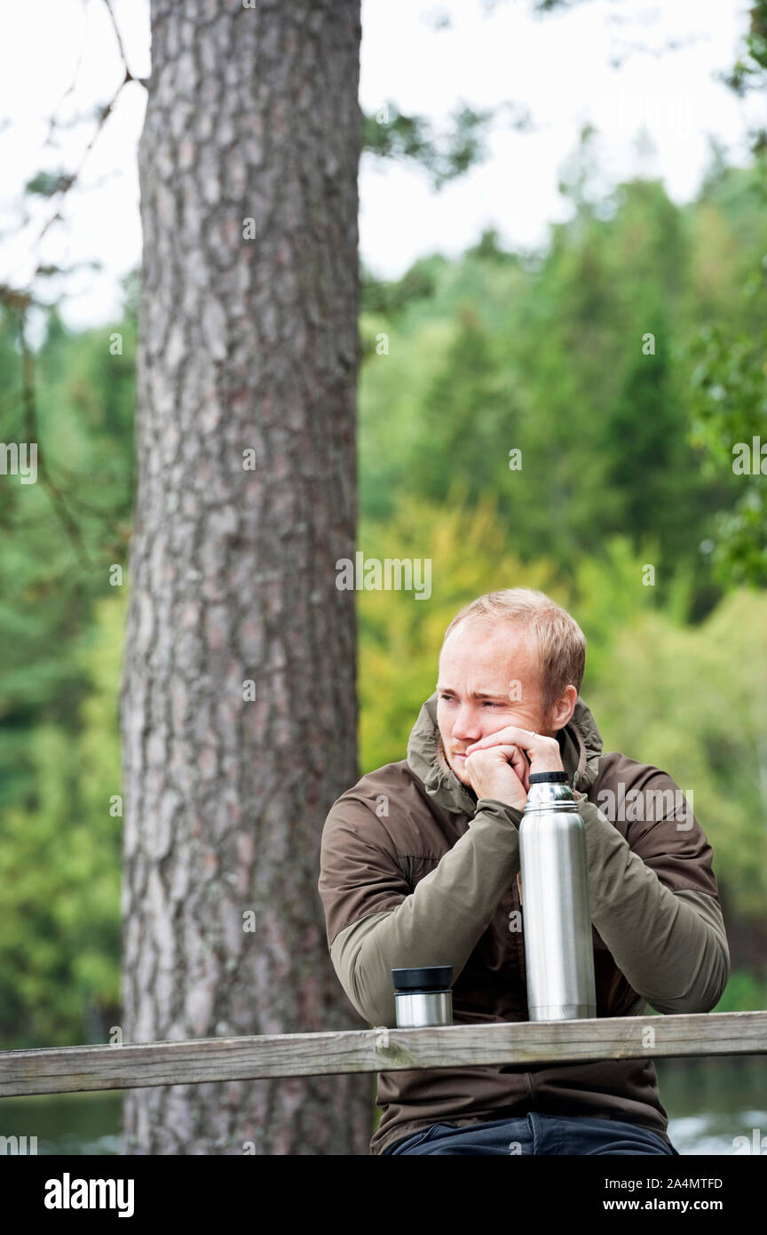 Thoughtful man resting Stock Photo