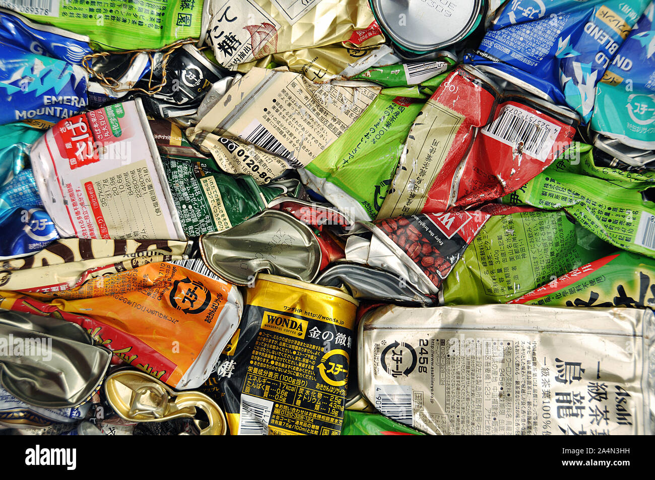 Compressed japanese beer and drinks metallic cans ready for recycling in Tokyo, Japan Stock Photo