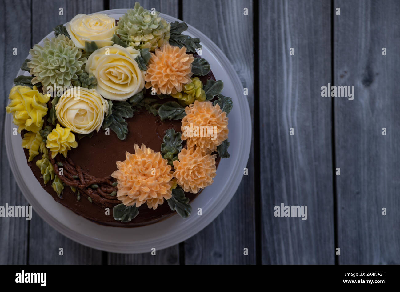 Ganache Buttercream Cake With Piped Buttercream Flowers Stock Photo Alamy