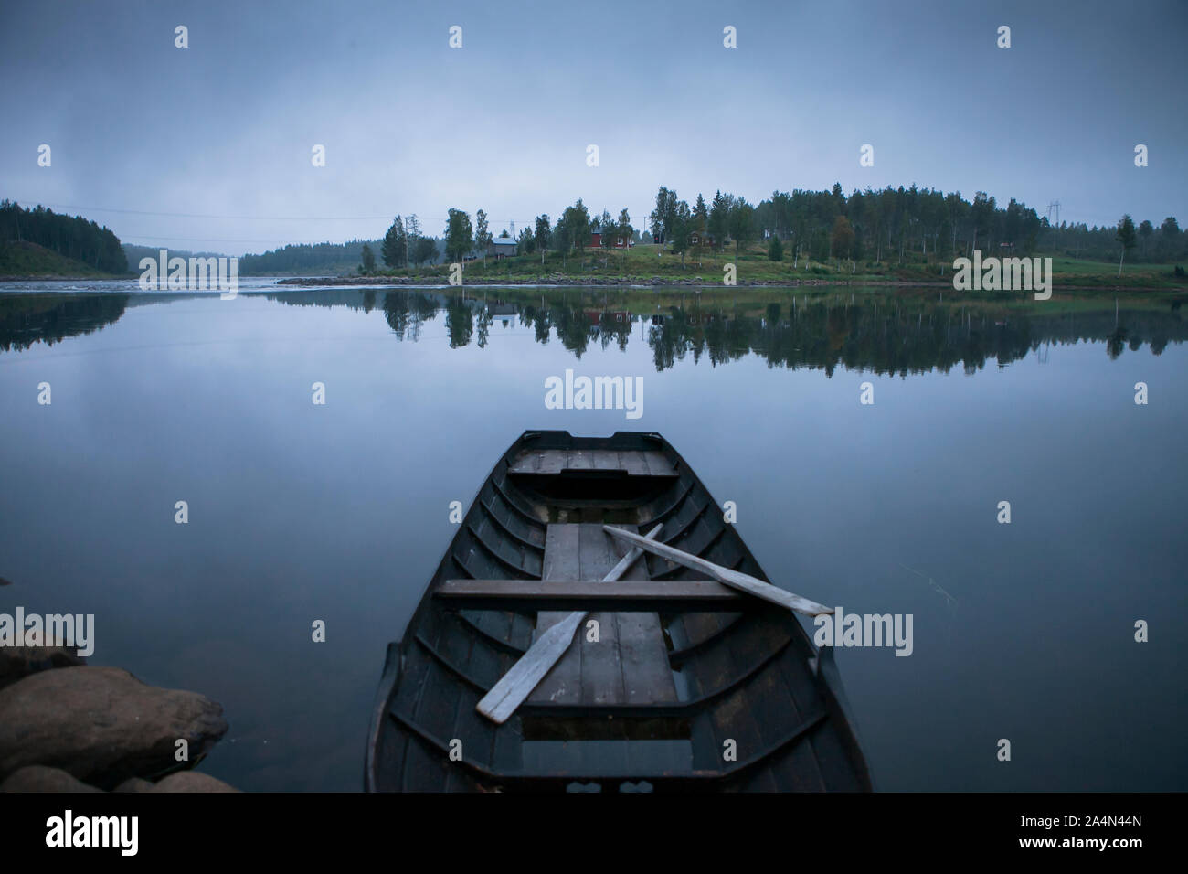 Rowing boat on lake Stock Photo - Alamy