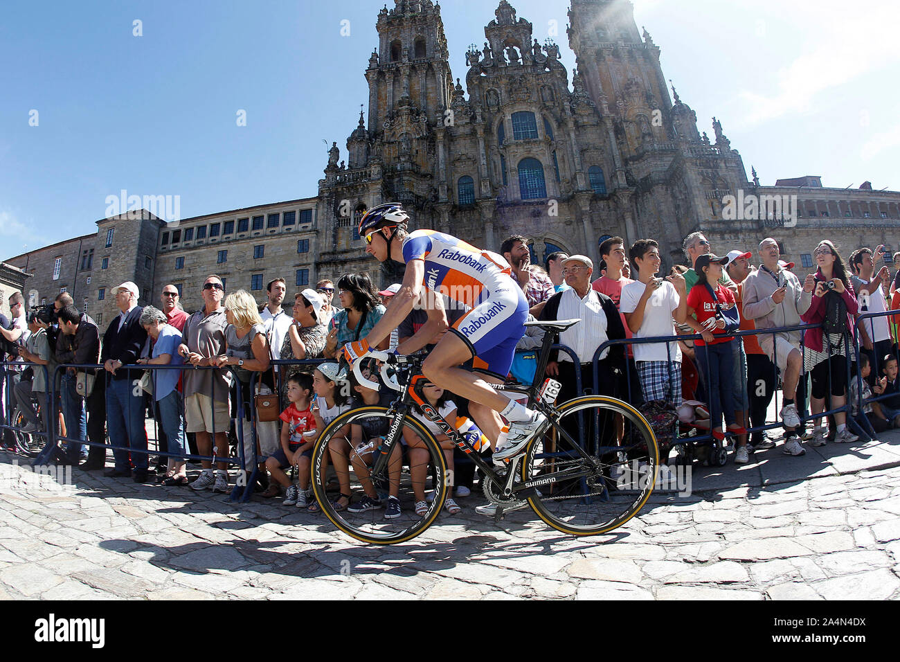 Bauke Mollema passes by the front of the Obradoiro of the Cathedral of Santiago de Compostela before the stage of La Vuelta 2012 between Santiago de C Stock Photo