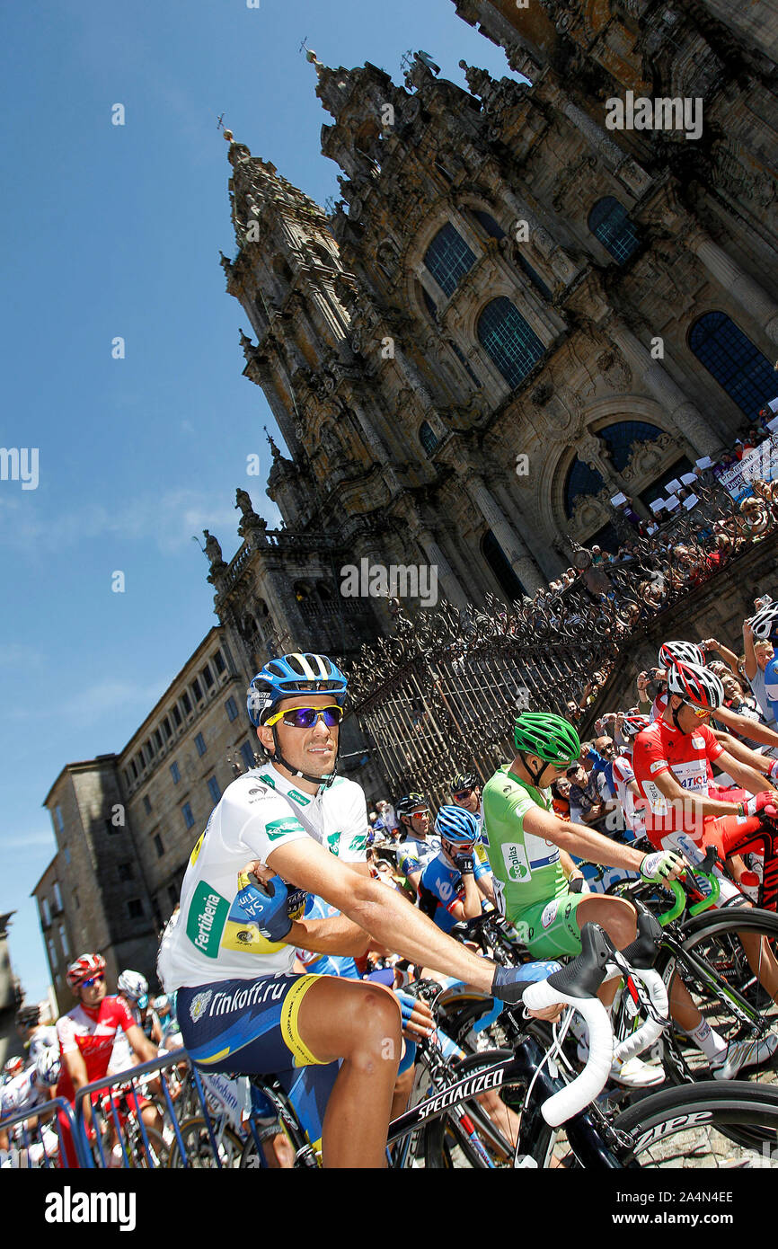 Alberto Contador passes by the front of the Obradoiro of the Cathedral of Santiago de Compostela before the stage of La Vuelta 2012 between Santiago d Stock Photo