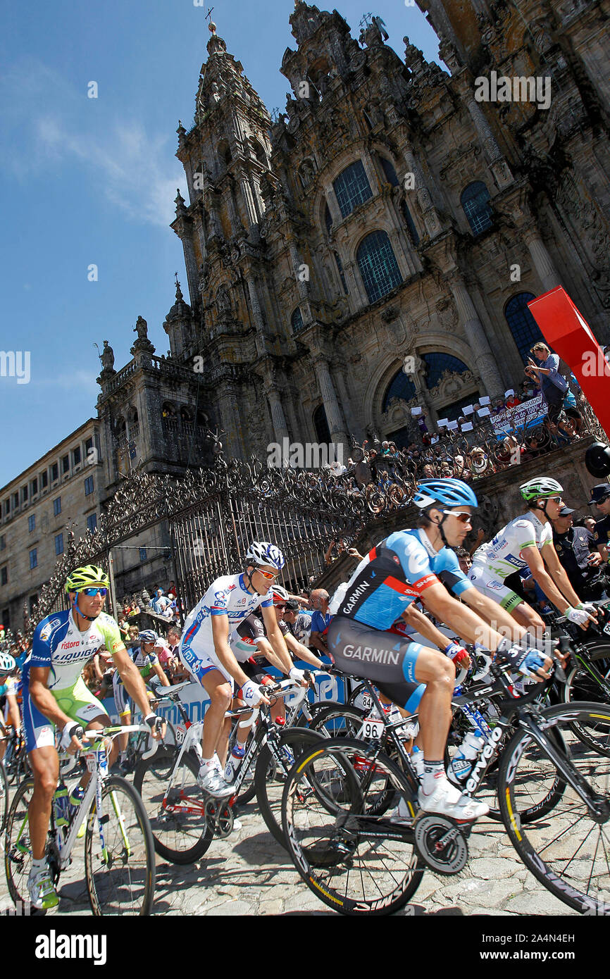 Chritophe Le Mevel and the peloton passes by the front of the Obradoiro of the Cathedral of Santiago de Compostela before the stage of La Vuelta 2012 Stock Photo