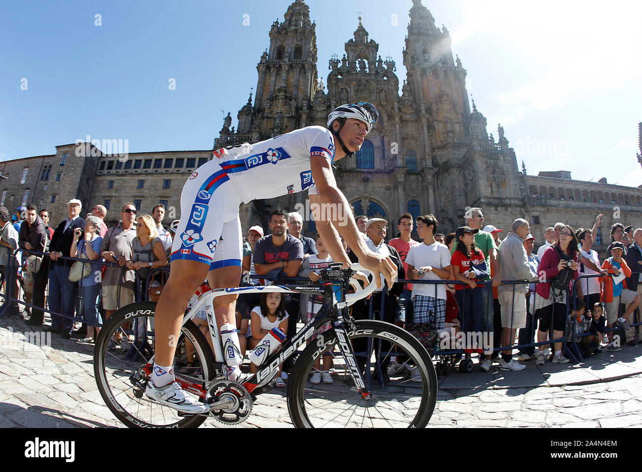 William Bonnet passes by the front of the Obradoiro of the Cathedral of Santiago de Compostela before the stage of La Vuelta 2012 between Santiago de Stock Photo