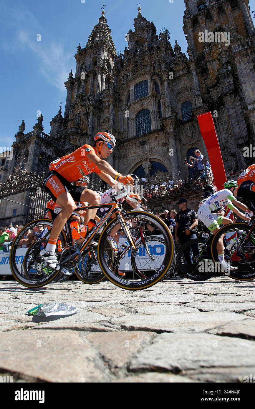 Igor Anton and the peloton passes by the front of the Obradoiro of the Cathedral of Santiago de Compostela before the stage of La Vuelta 2012 between Stock Photo