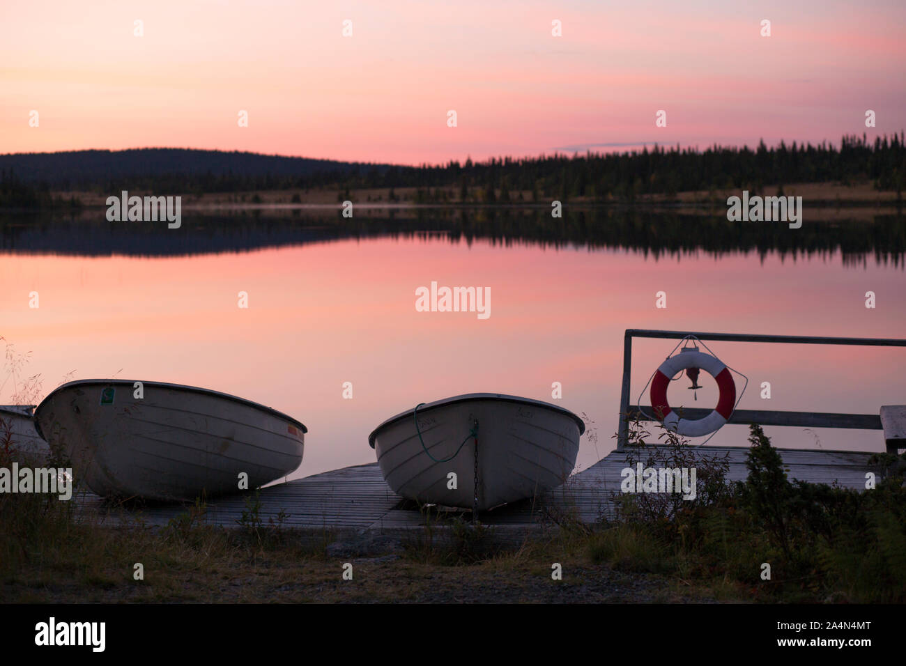 Rowing boats at lake Stock Photo - Alamy