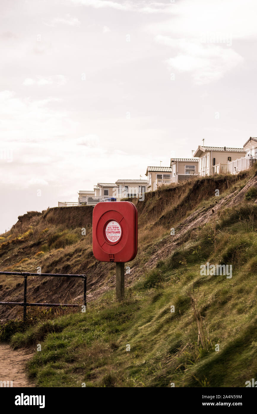view along the Holderness coastline showing Hornsea Caravan park close to cliff top due to coastal erosion. Stock Photo