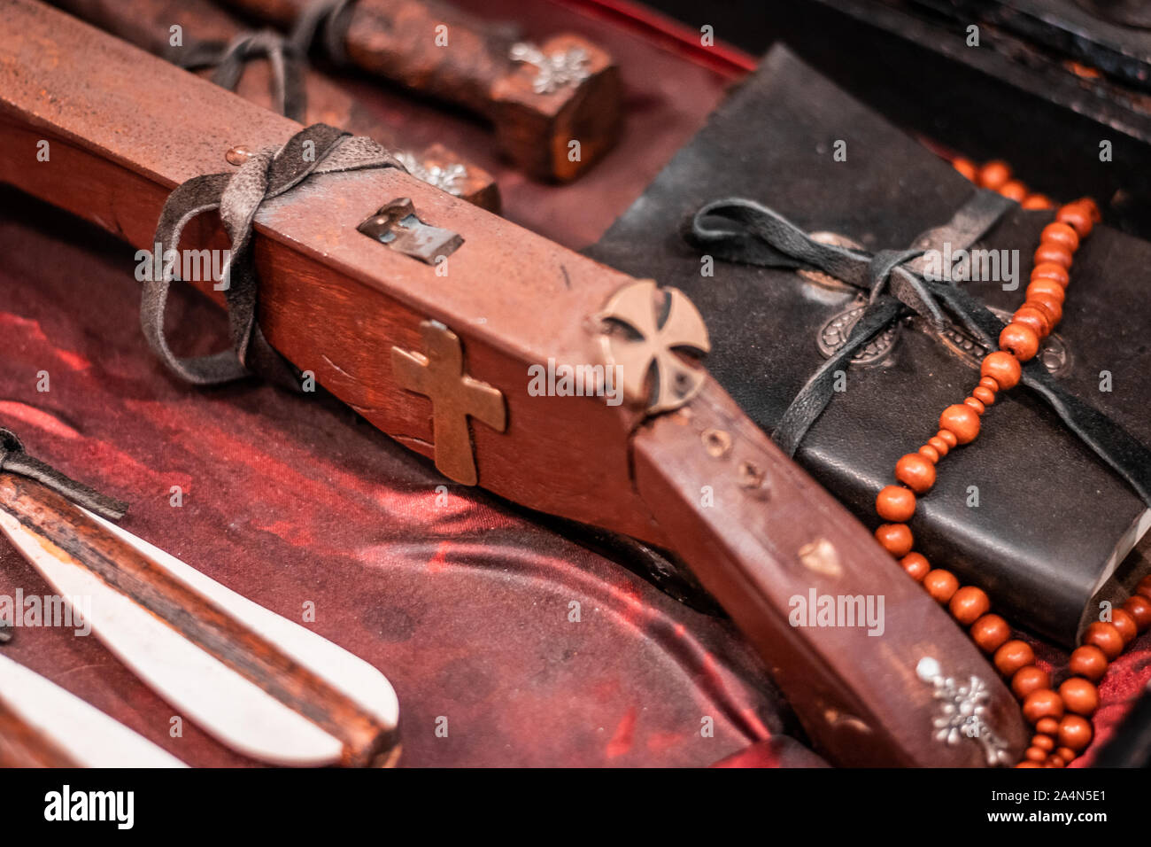 Vampire and zombie killing kit. Medieval weapons, handmade wooden bow and crosses. Inquisition hunter, halloween theme,folklore. Inspired by tv shows Stock Photo