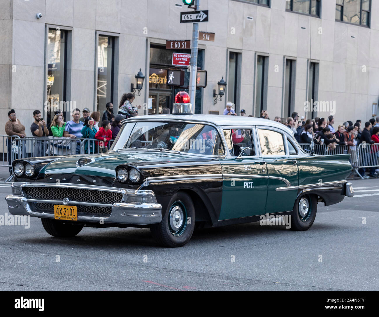 New York, NY, USA - October 14, 2019: Vintage police car moves along Fifth Avenue during 75th Annual Columbus Day Parade, Manhattan. The annual Columb Stock Photo