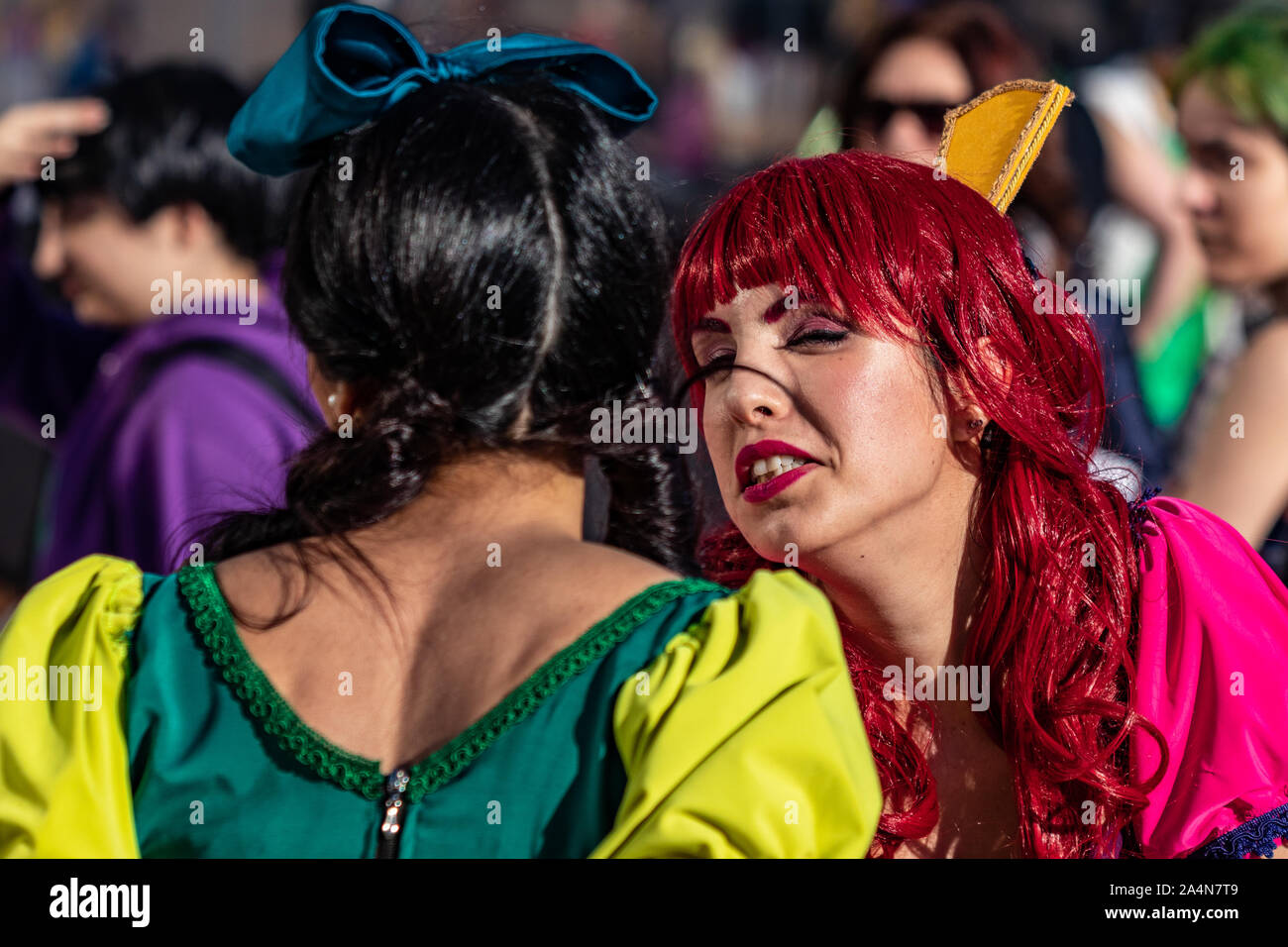 Rome, Italy, 5 April 2019, Comic and Cosplayer event called "Romics". Close-ups and medium shots of Cinderella actress in daylight. The crowd in costume. Stock Photo
