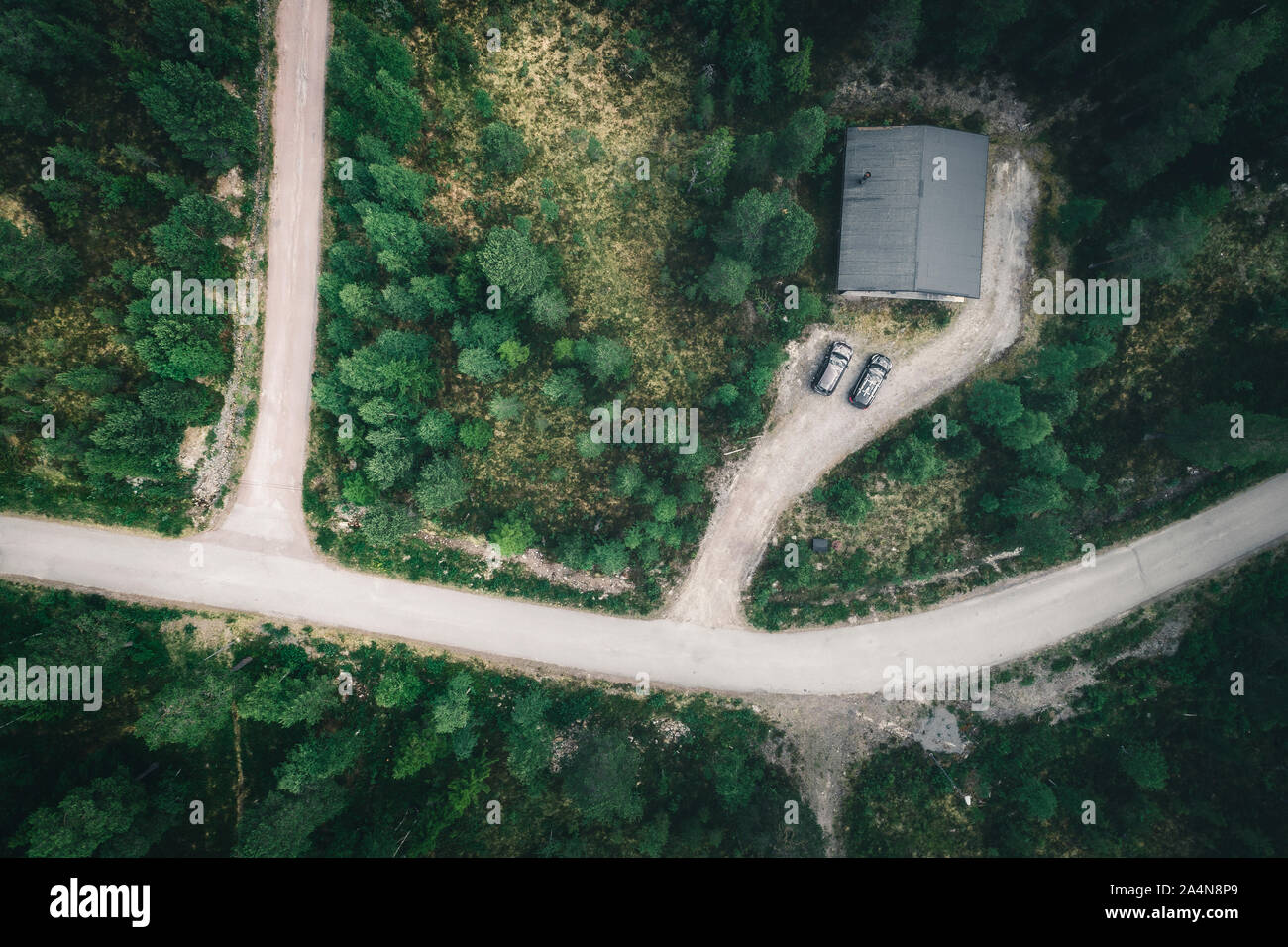Aerial view of house in forest Stock Photo - Alamy