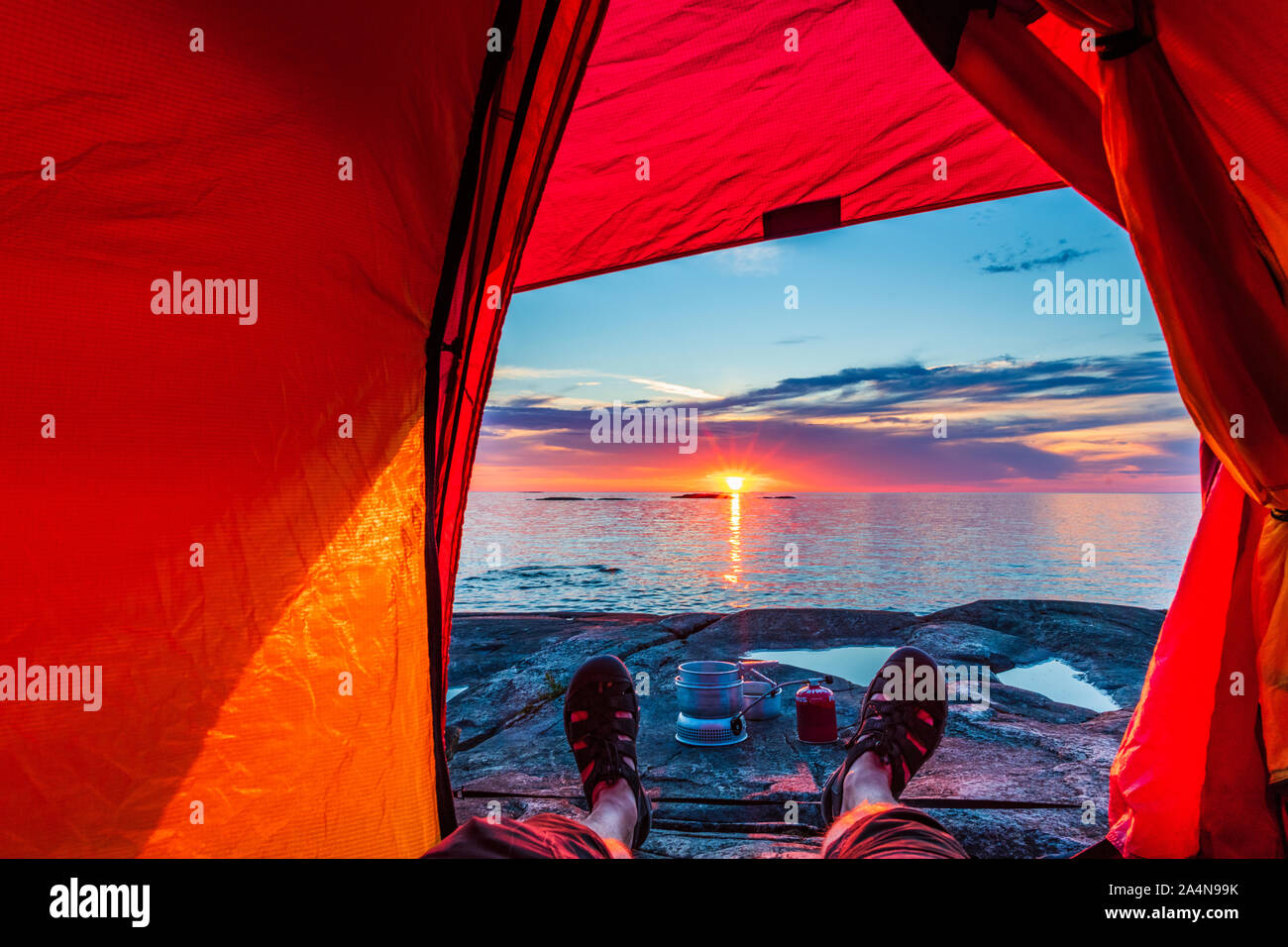 Mature man lying in tent hi-res stock photography and images - Alamy