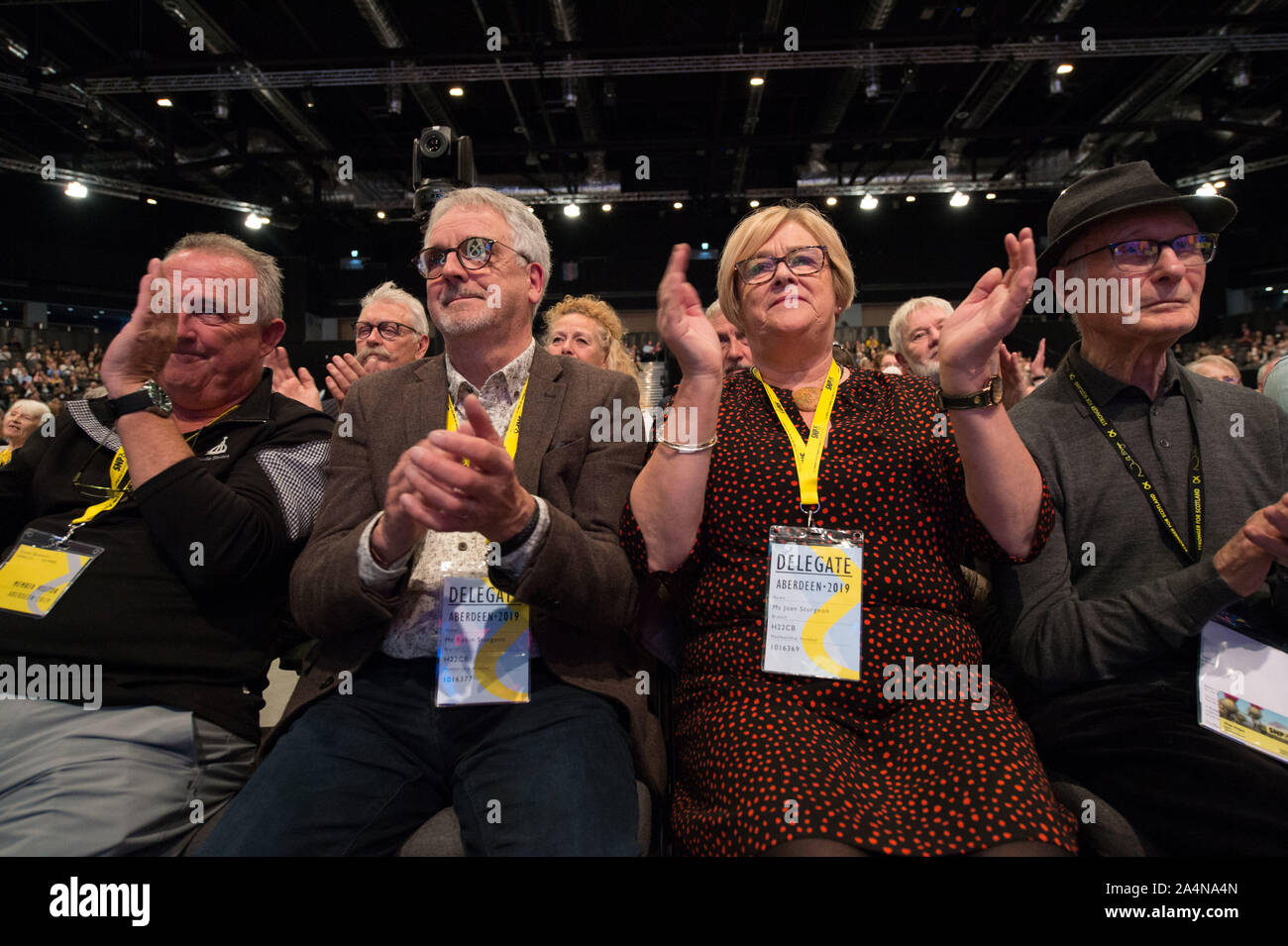 Aberdeen, UK. 15 October 2019.  Pictured:  (left of centre) Robin Sturgeon, and , (right of centre) Joan Sturgeon. Nicola Sturgeon - First Minister of Scotland and Leader of the Scottish National Party (SNP) delivers her keynote speech on getting Scottish Independence to close the Scottish National Party Conference, Aberdeen, The Event Complex Aberdeen (TECA). Credit: Colin Fisher/Alamy Live News Stock Photo