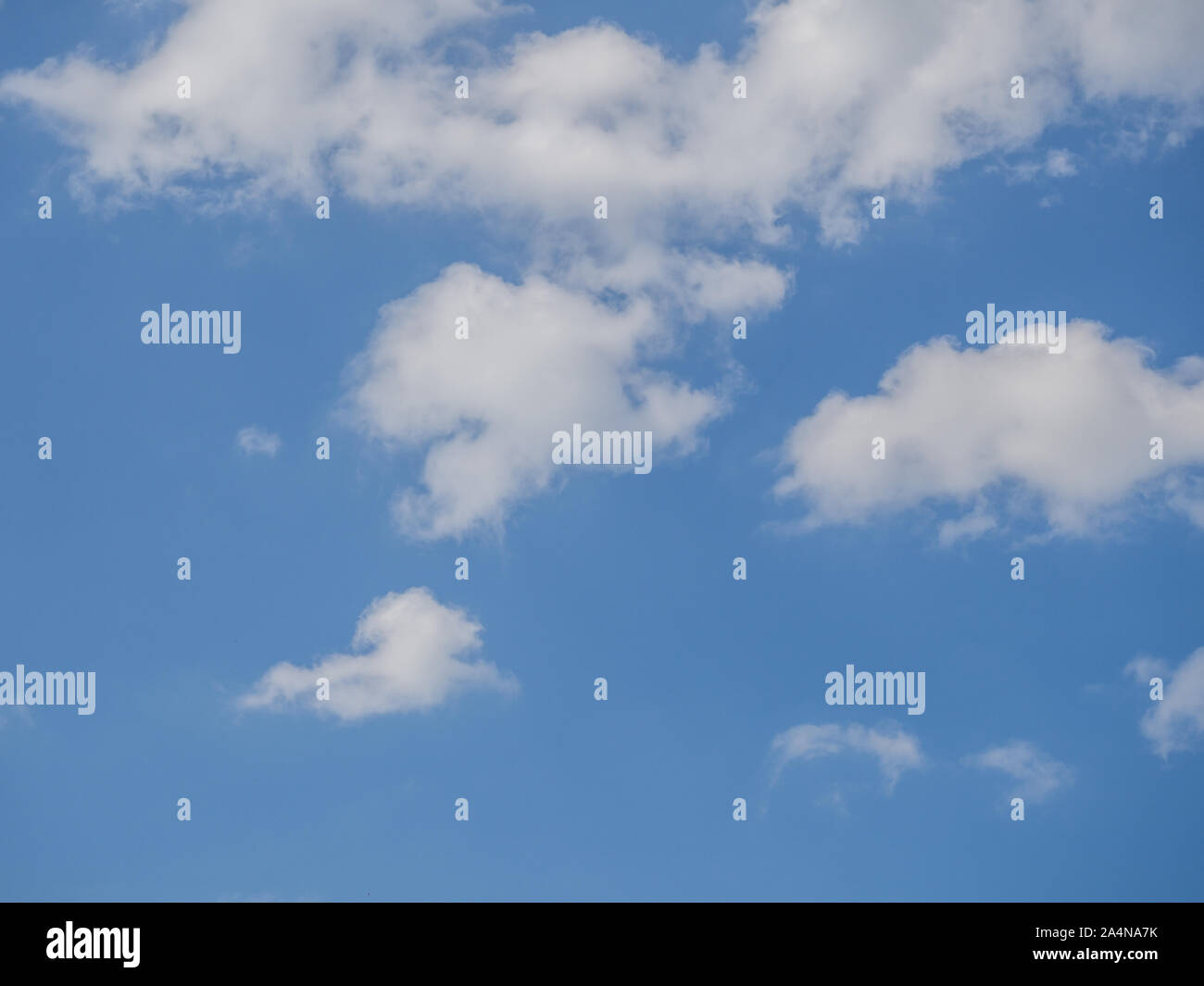 Blue sky with clouds in summer hi-res stock photography and images - Alamy