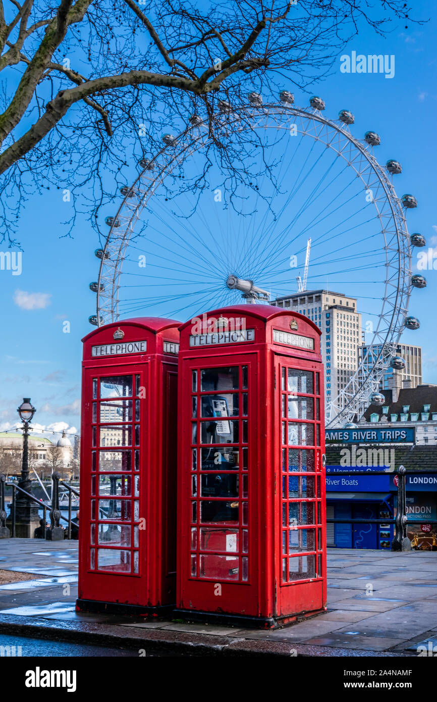 Phone boxes and the London Eye in the background. Morning in London. Stock Photo