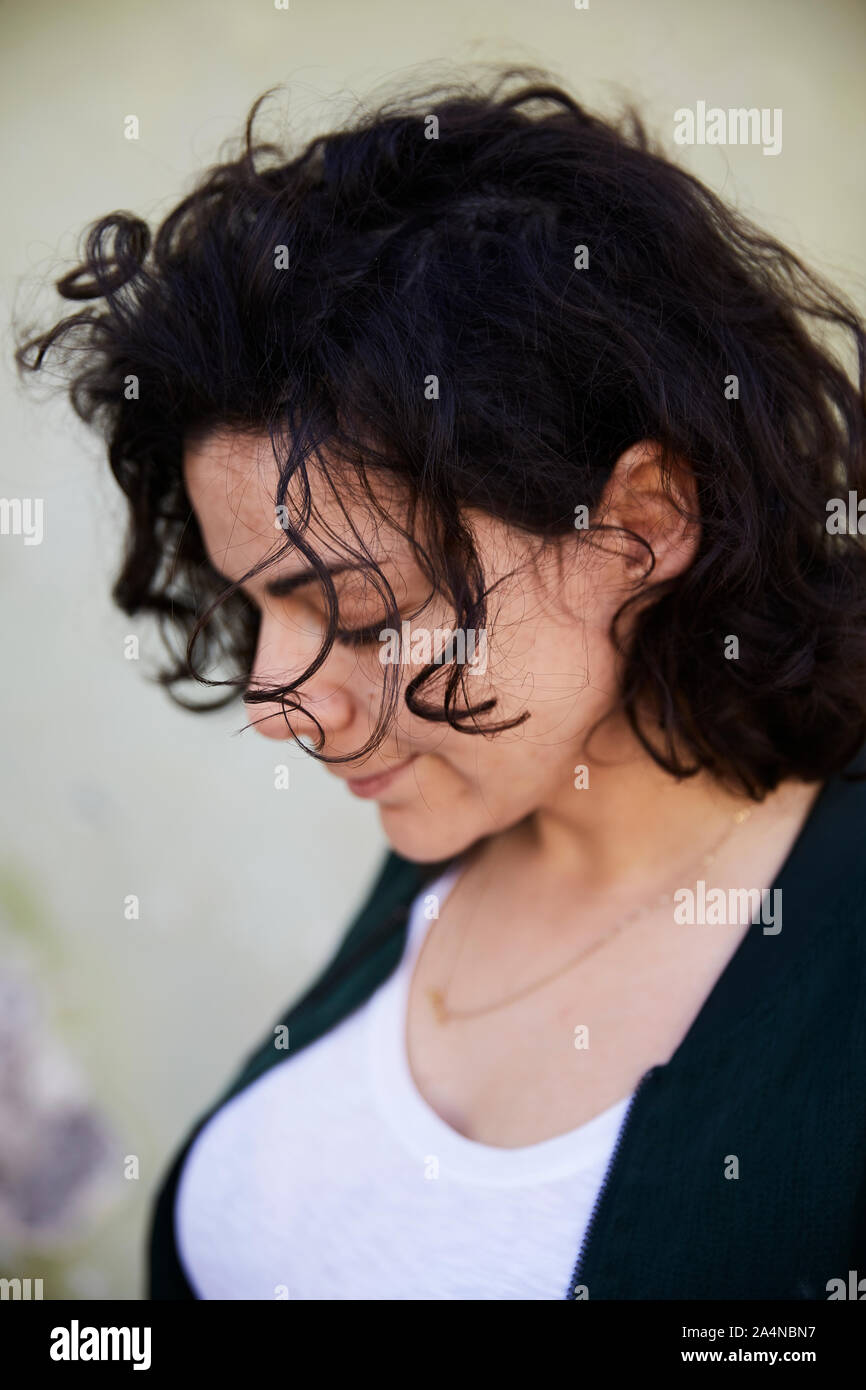 Black curly hair hi-res stock photography and images - Alamy