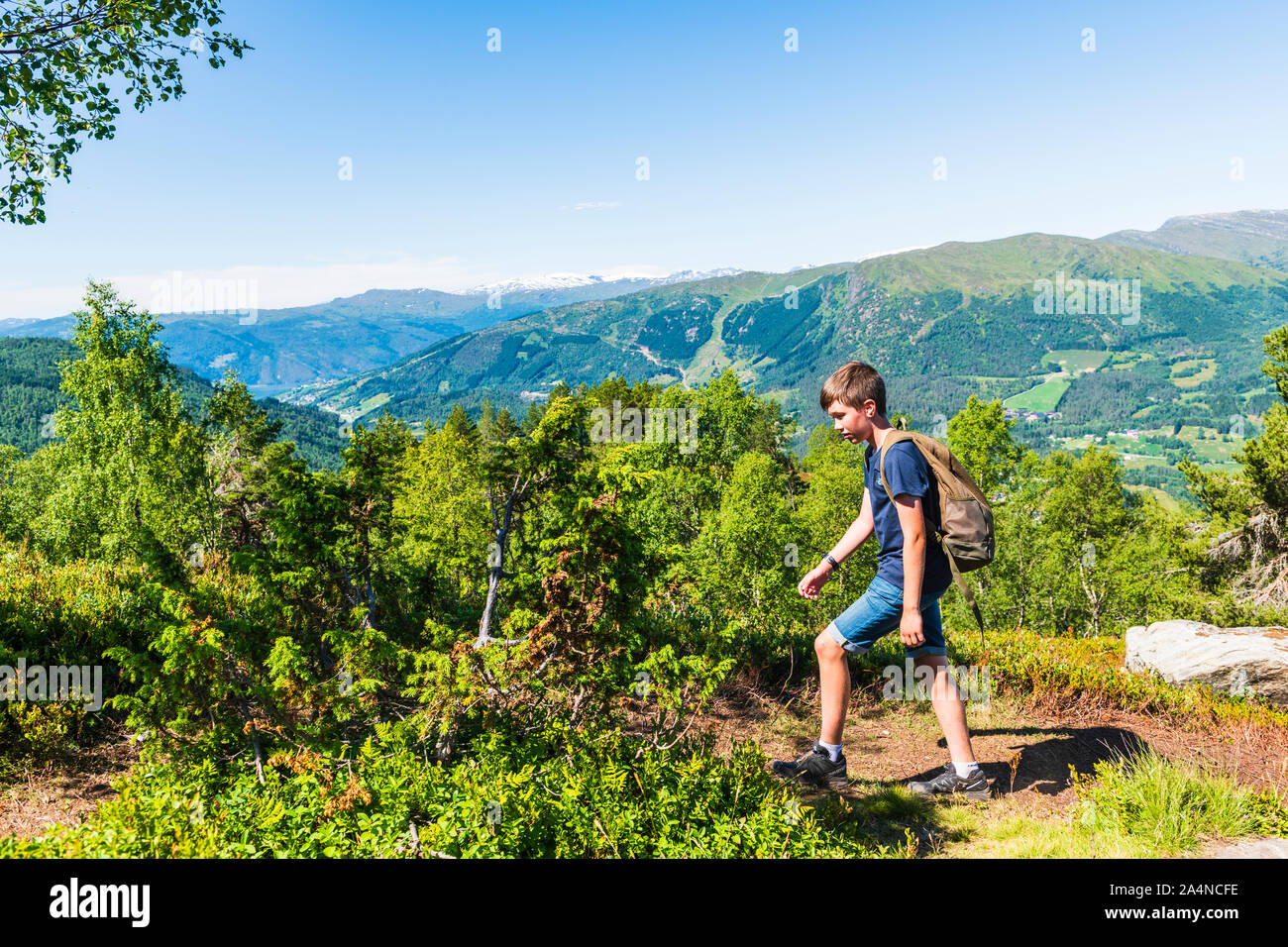 Boy hiking Stock Photo