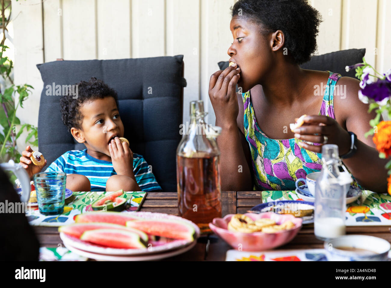 Mother and son having meal together Stock Photo