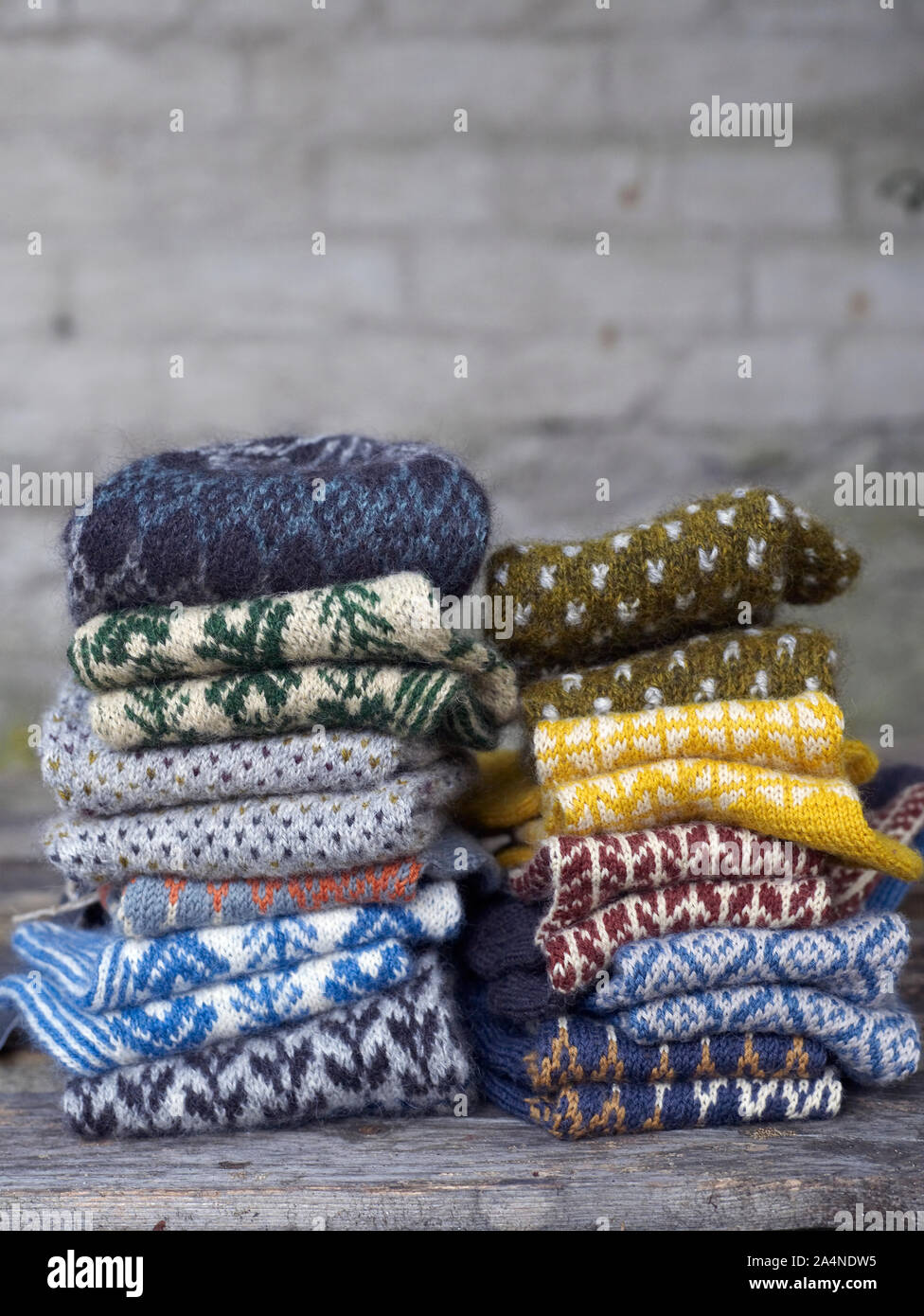 Stacks of knitted socks Stock Photo