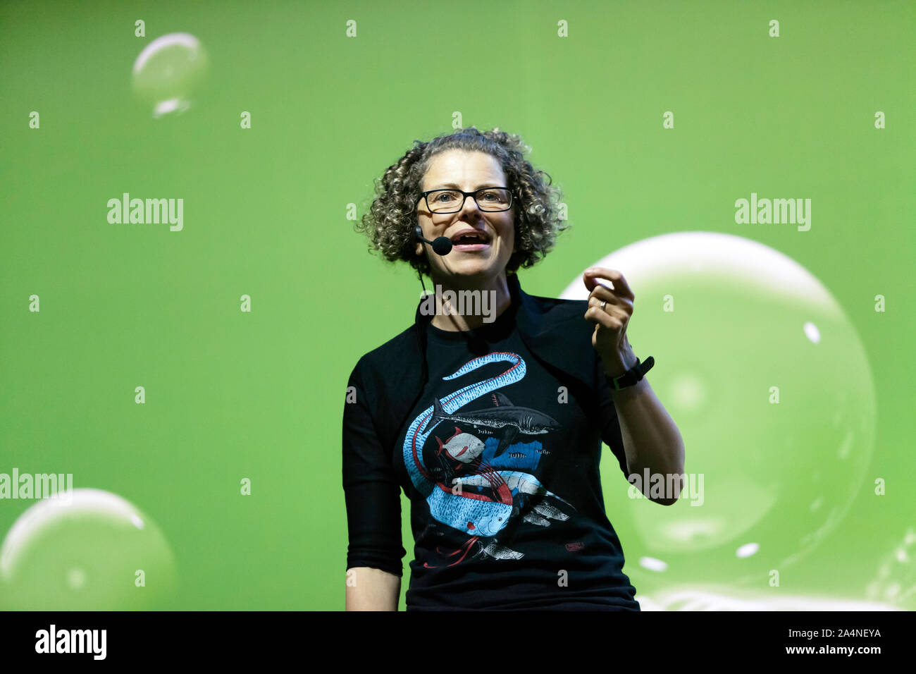 Helen Scales, Marine biologist, presenting a talk on Exploring the Wonders of the Deep Oceans. On the Earth Stage, at New Scientist Live 2019 Stock Photo