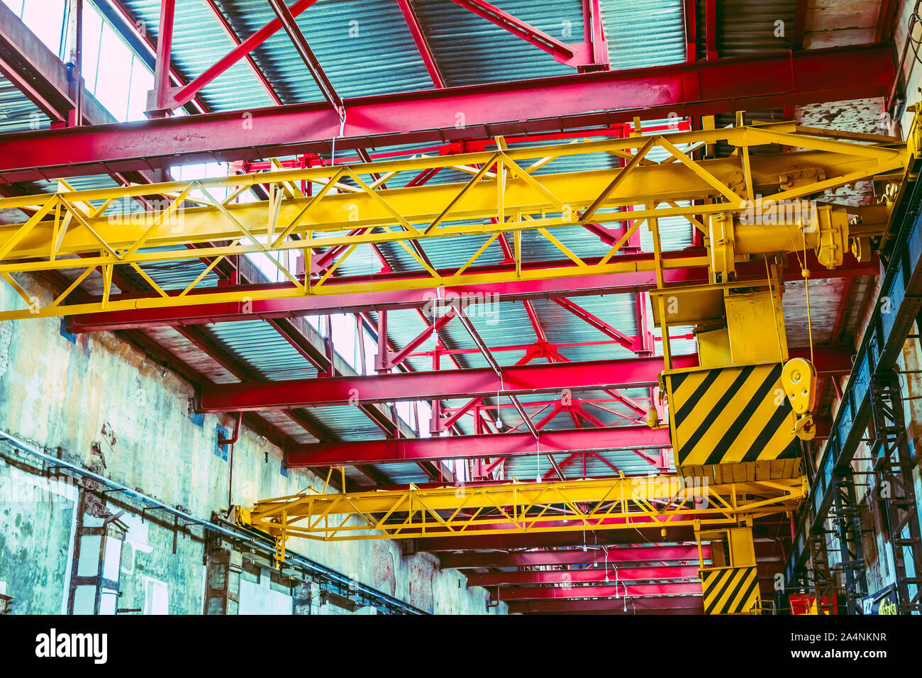 The interior of a big industrial building or factory with steel constructions Stock Photo