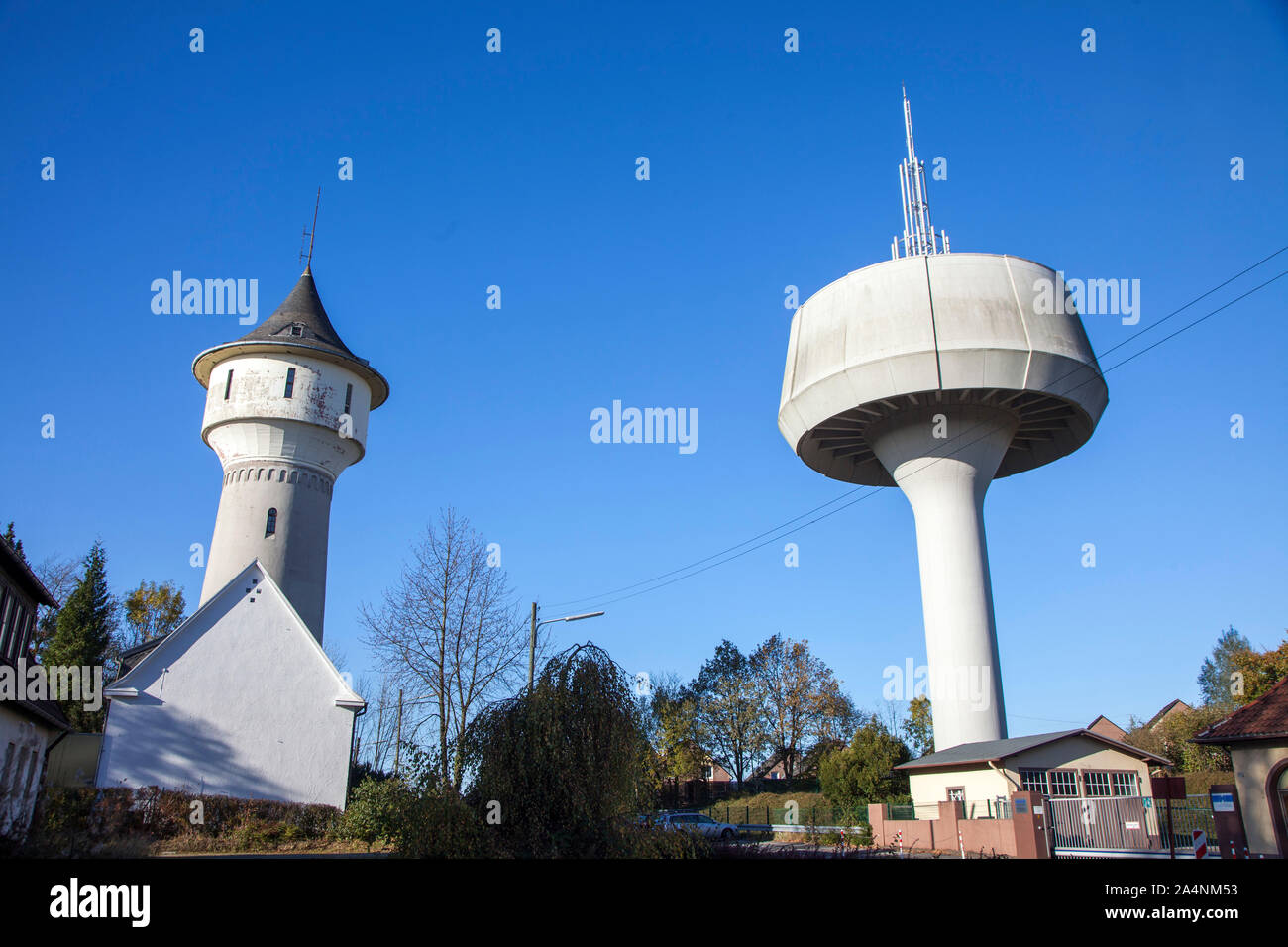 The old Hatzfeld water tower, and the new water tower, on the right, in Wuppertal Barmen, disused water tower for water supply, Stock Photo