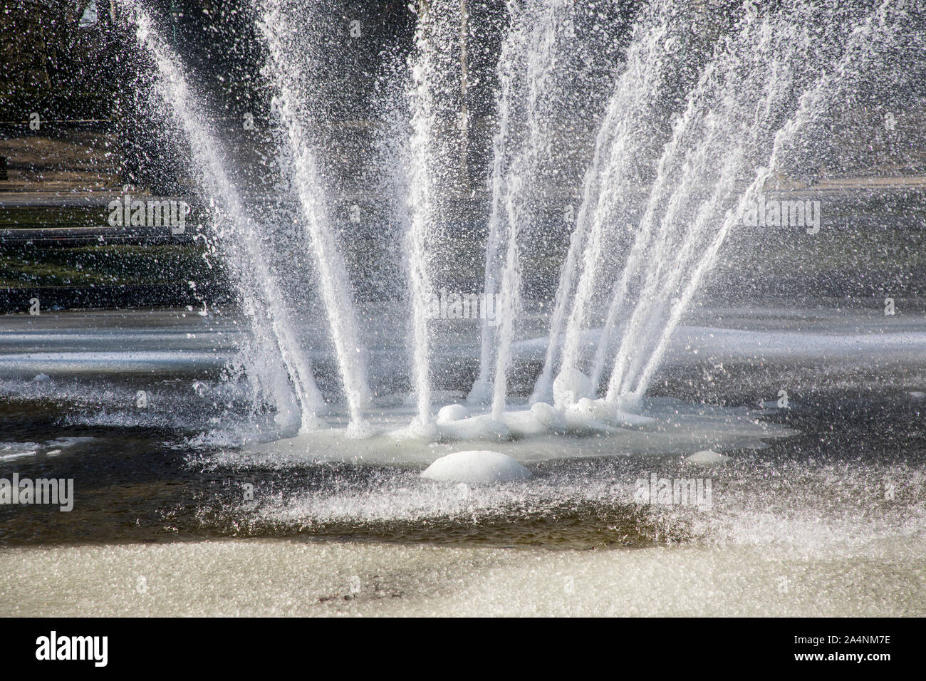 Fountain, water fountain, winter, partly frozen water at minus temperatures, Stock Photo