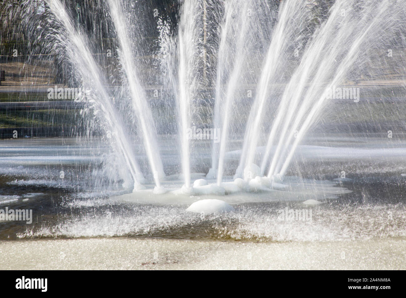 Fountain, water fountain, winter, partly frozen water at minus temperatures, Stock Photo