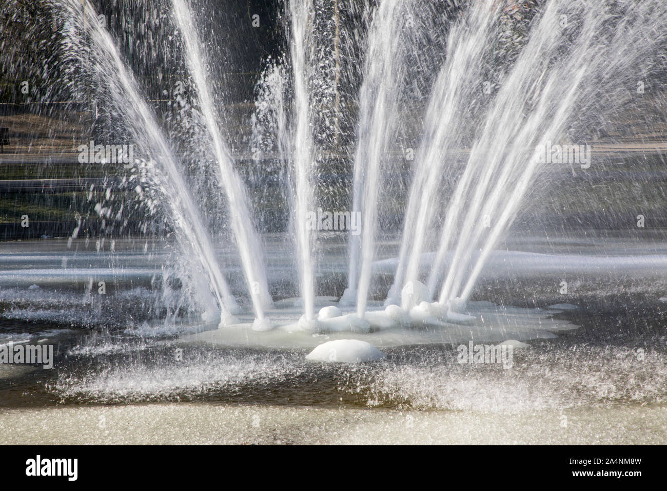 Fountain, water fountain, winter, partly frozen water at minus temperatures, Stock Photo
