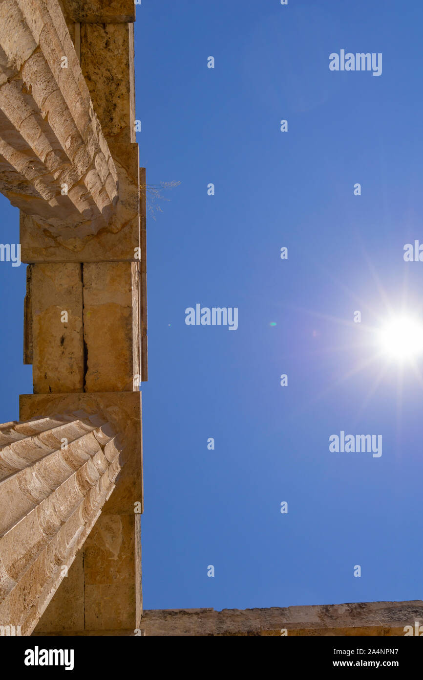 Columns towering overhead in ancient Temple of Zeus remains from about 500 BC in Nemea in the Peloponesse region Greece. Stock Photo