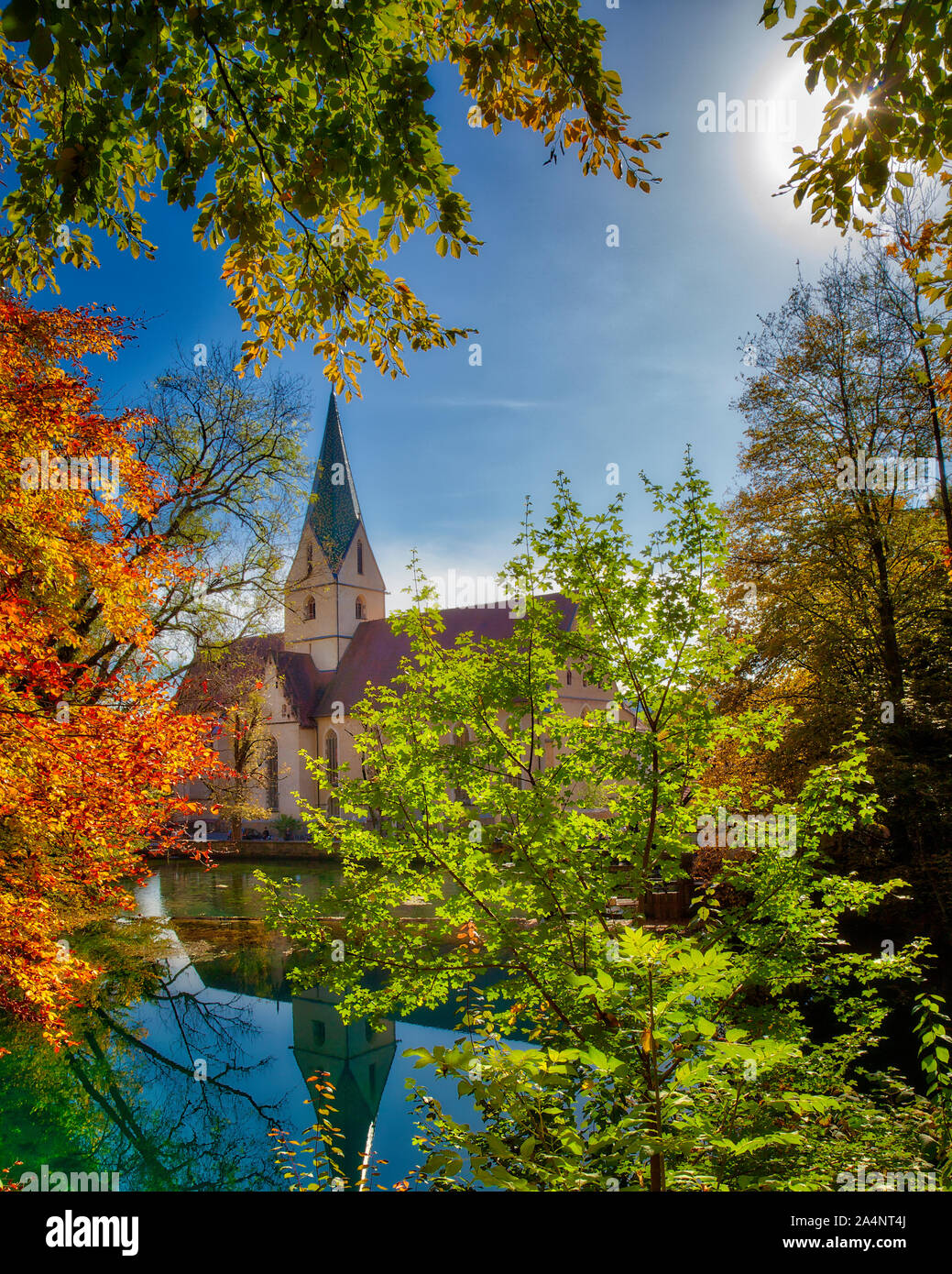 DE - BADEN-WÜRTTEMBERG: The Blautopf and Blaubeuren Abbey (A UNESCO World Heritage Site) Stock Photo