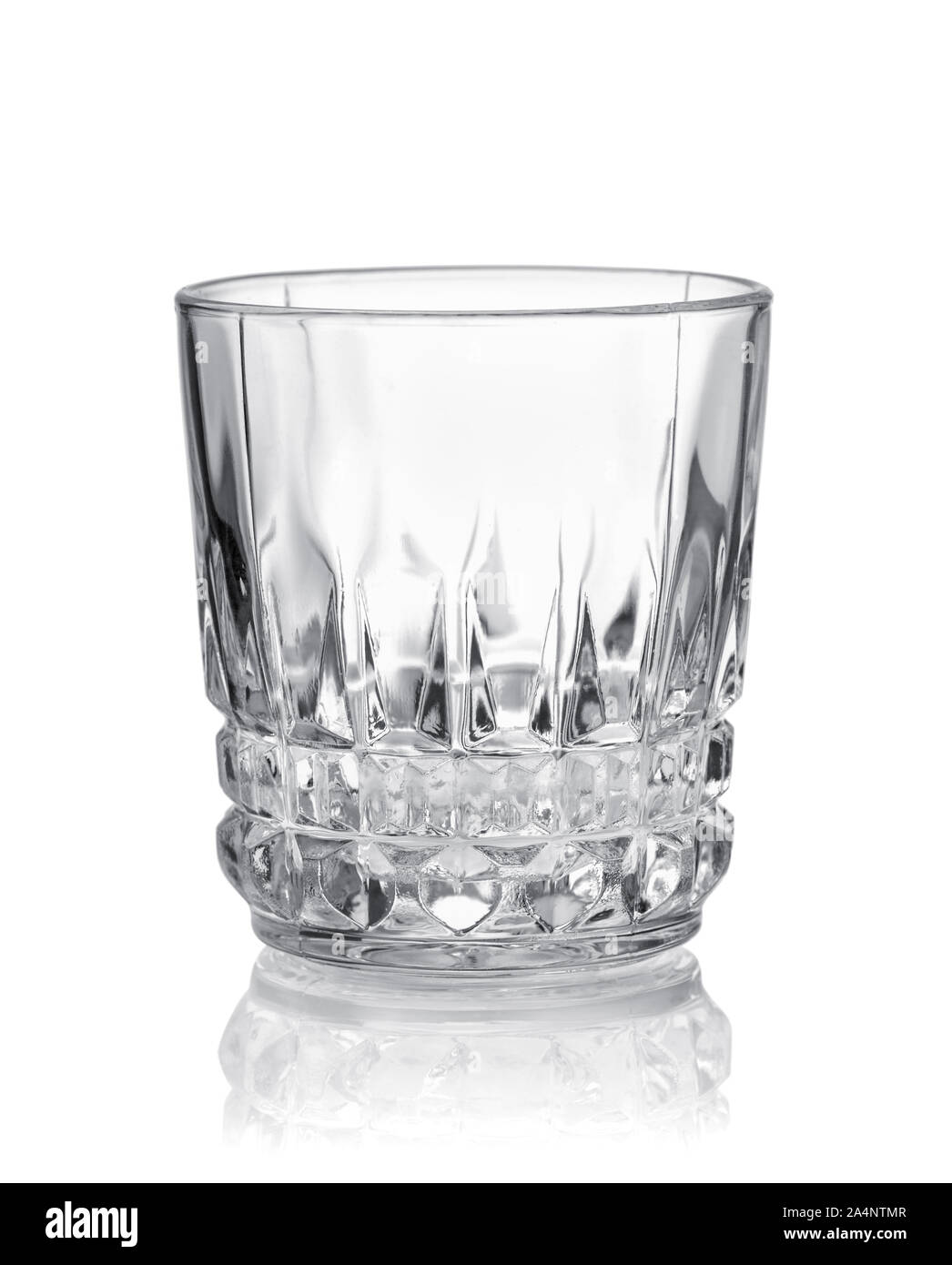 Front view of empty crystal cut shot glass isolated on white Stock Photo
