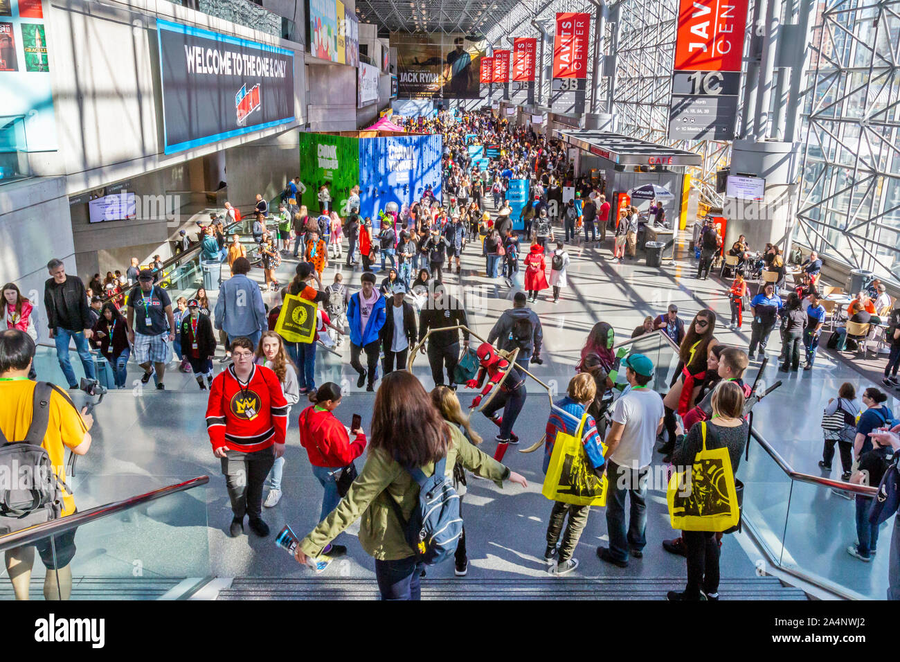 Visitors and fans attend the New York Comic Con Comic Book, Movie and Convention. Stock Photo