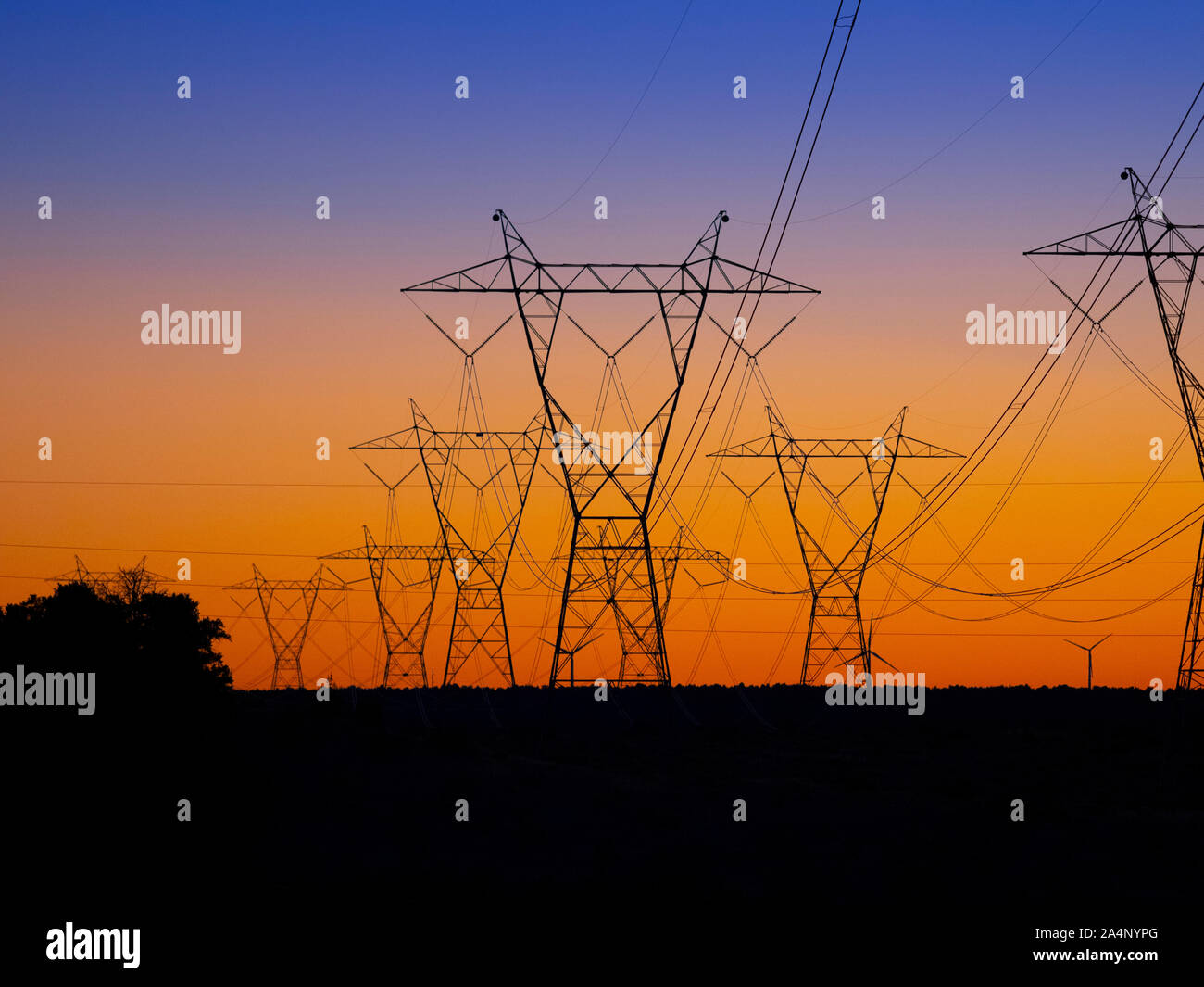 Communication tower on blue sky in desert Stock Photo