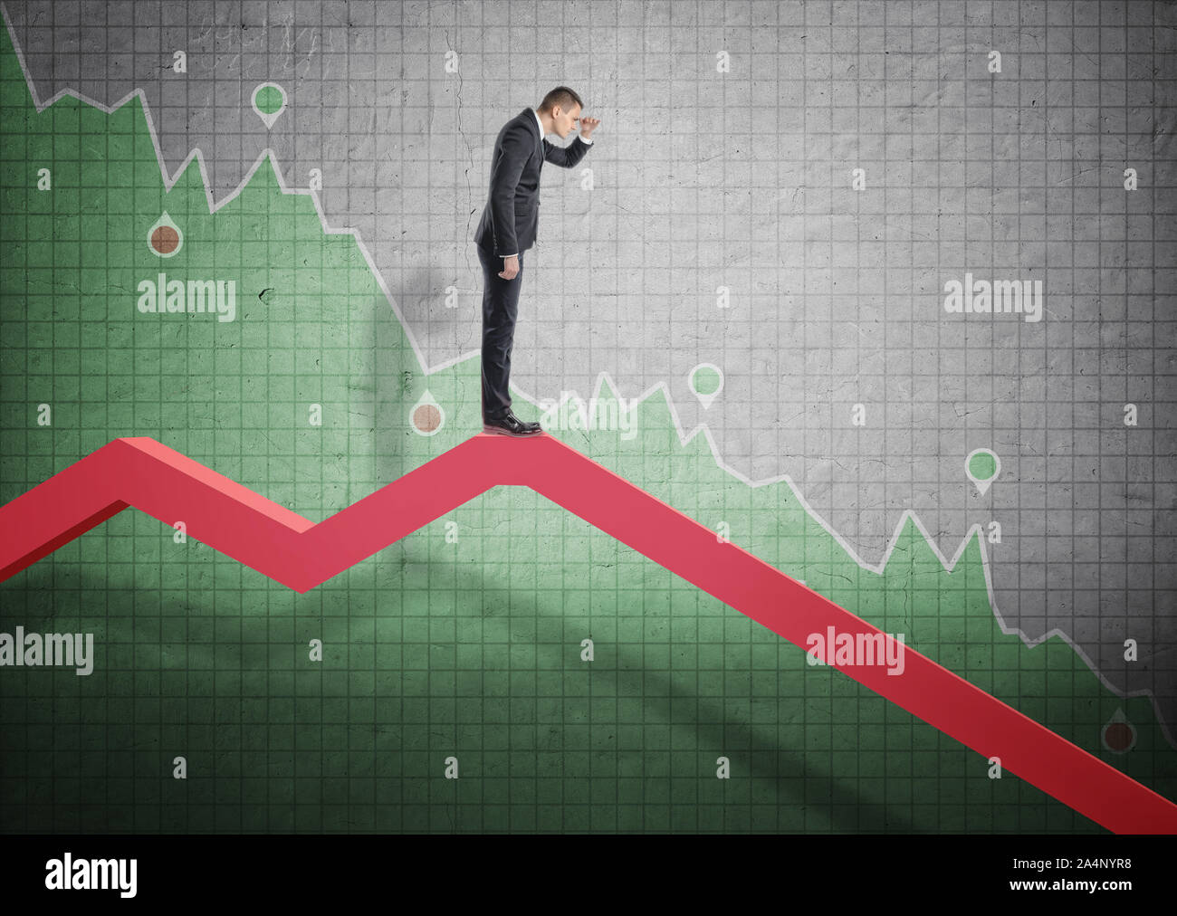 Businessman standing on falling diagram and peering into the future