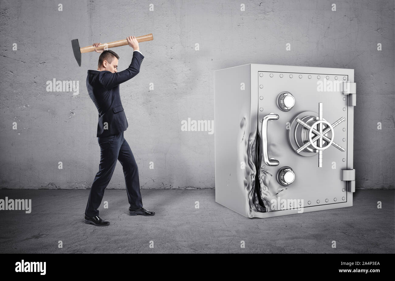 Businessman holding hammer over his head, and safe with its door broken Stock Photo