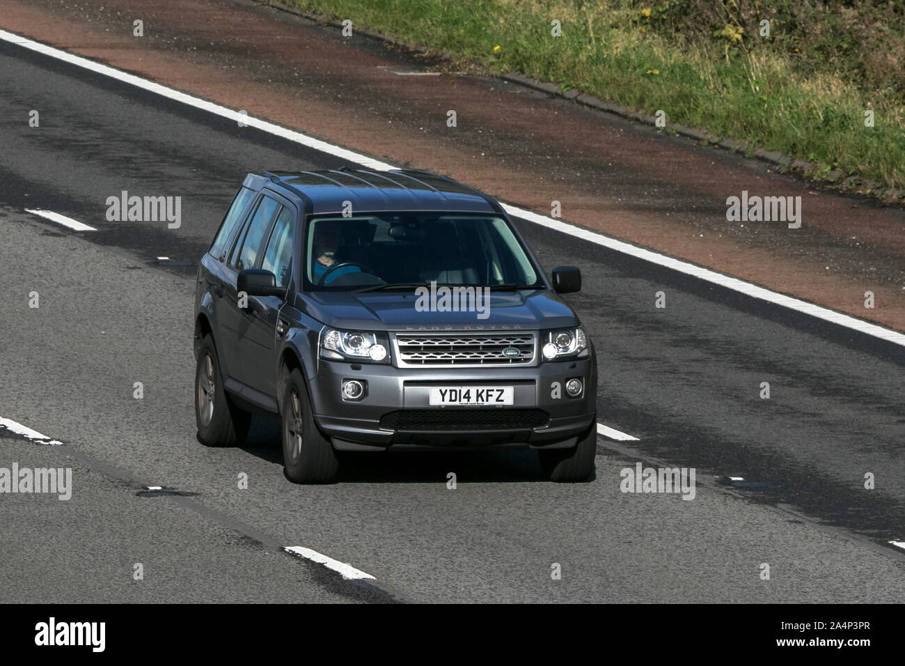 2014 grey Land Rover Freelander GS TD4; traveling on the M6 motorway near Preston in Lancashire, UK Stock Photo