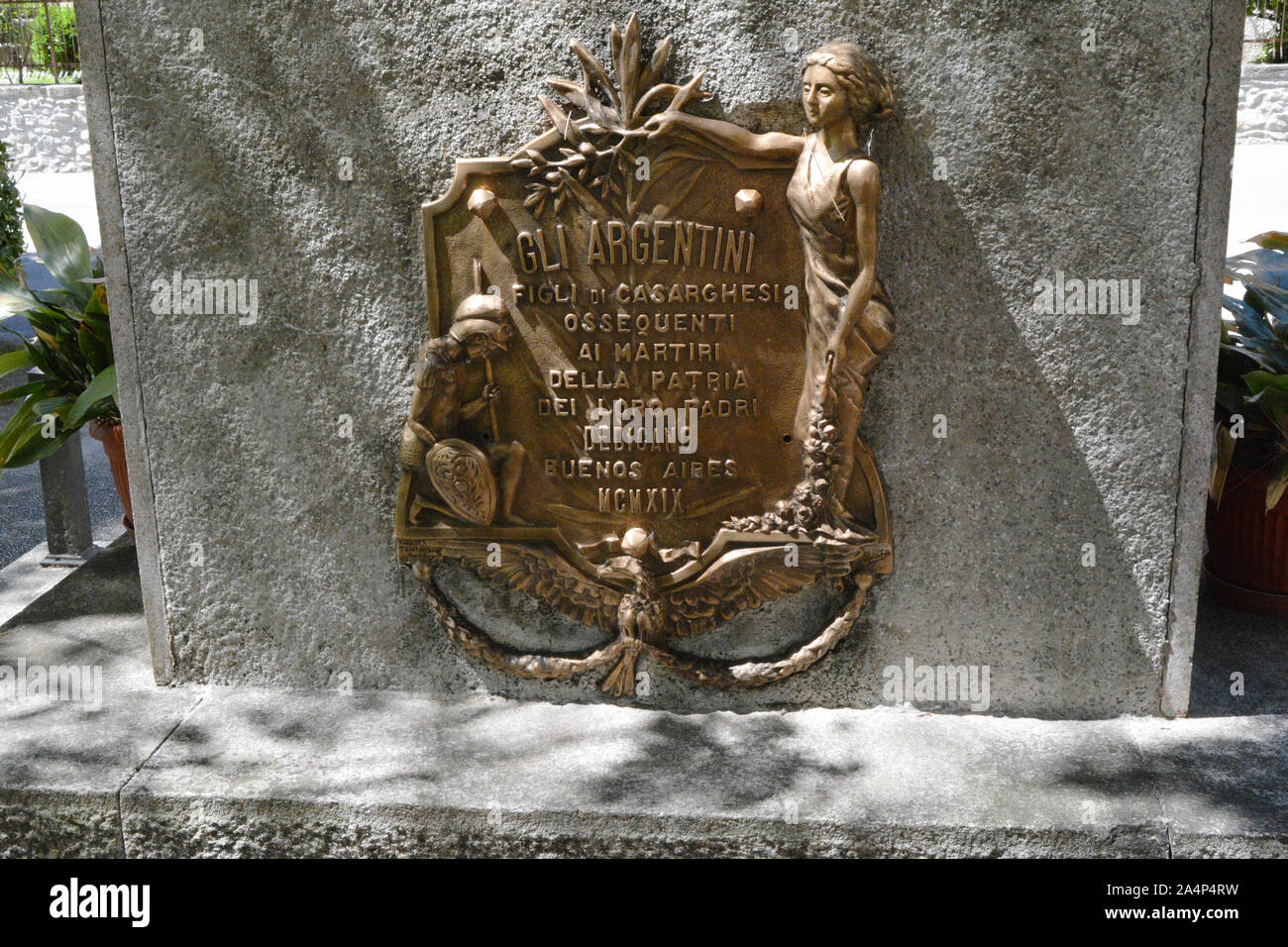 Commemorative plaque on war memorial in Casargo Stock Photo