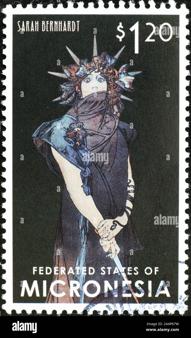 Sarah Benhardt designed by Alphonse Mucha on postage stamp Stock Photo