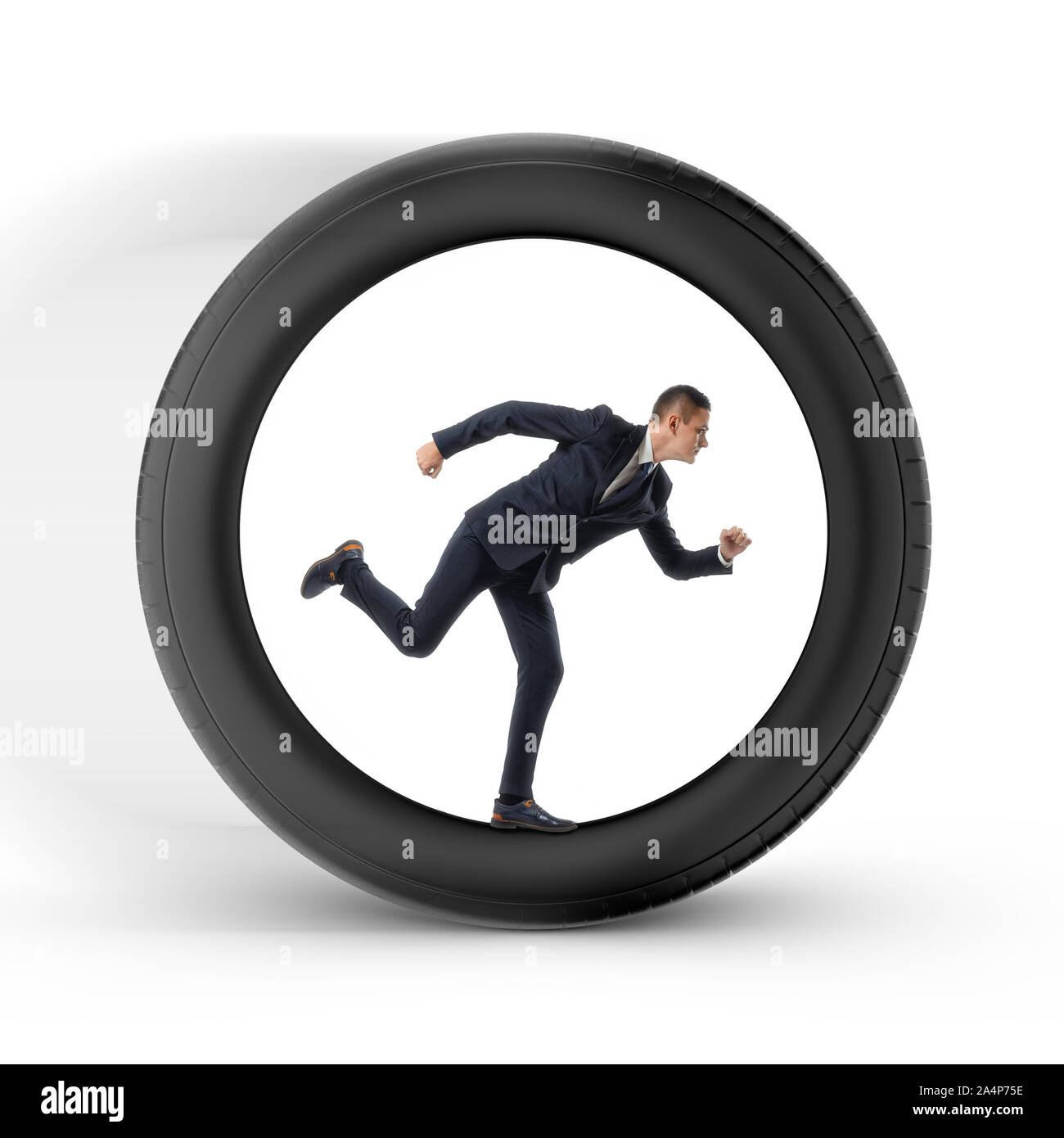 Businessman to be pressed for time is running in the center of a big wheel Stock Photo
