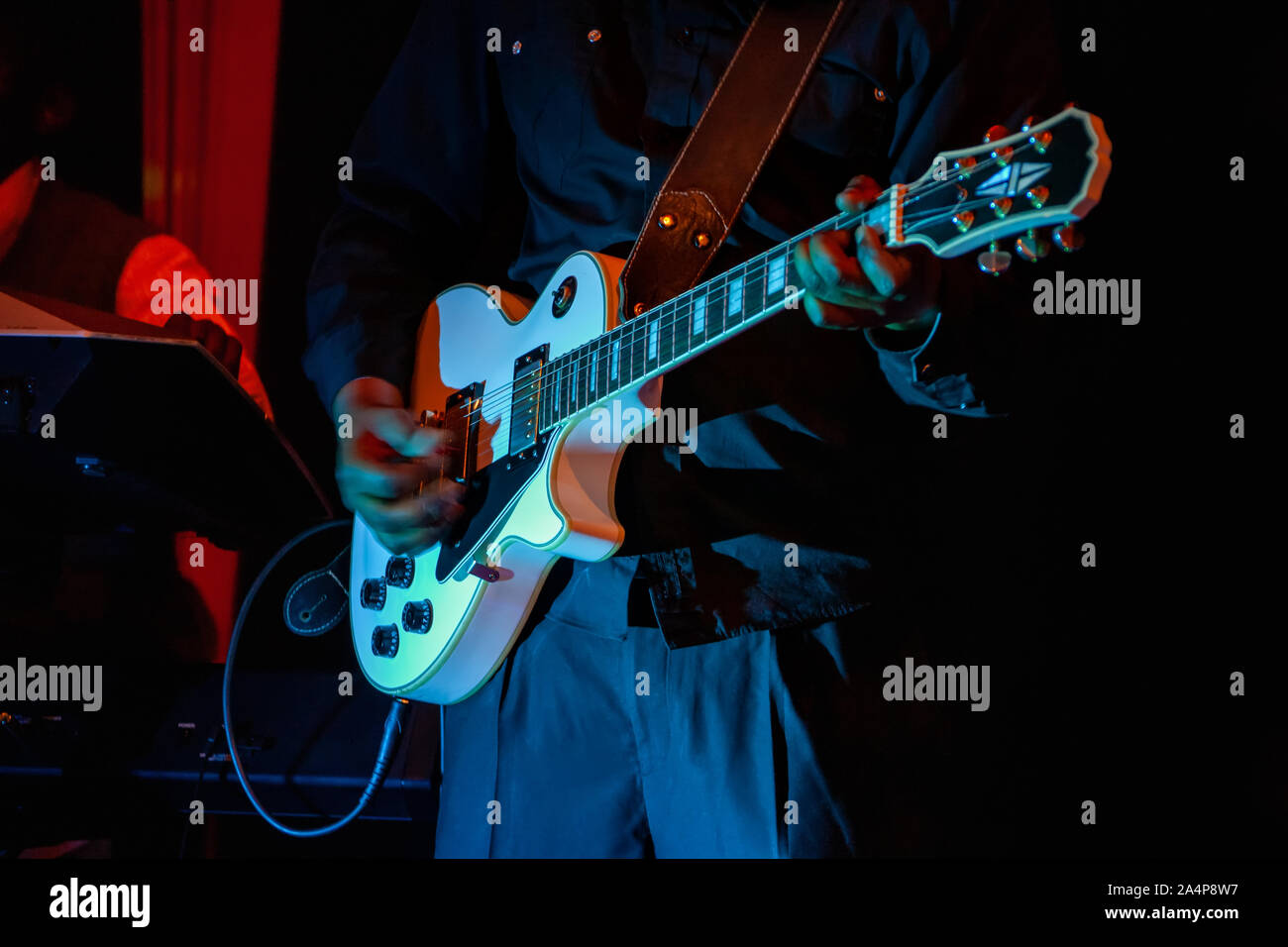 African man singing at an electric guitar Stock Photo - Alamy