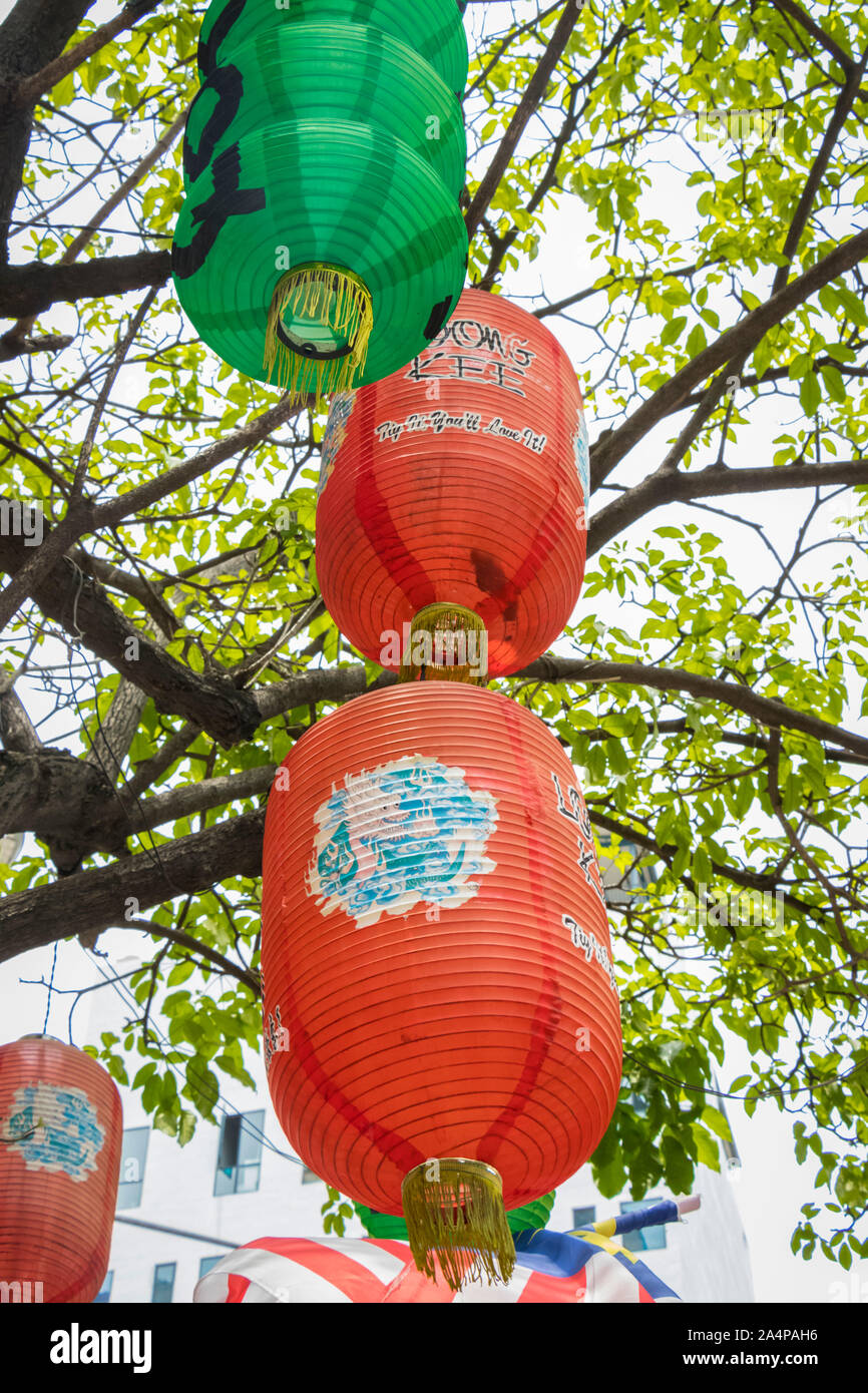 Lanterns hanging from trees hi-res stock photography and images - Alamy