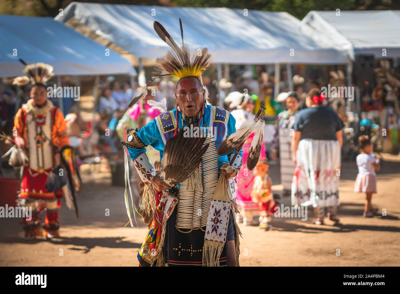 Powwow. Greg Red Elk, longtime Pow Wow participant. Close up portrait of Native American in full Regalia. Santa Ynez Chumash Inter-Tribal Pow Stock Photo