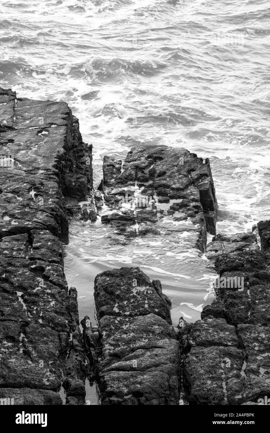 Rocky shore sea waves Black and White Stock Photos & Images - Alamy