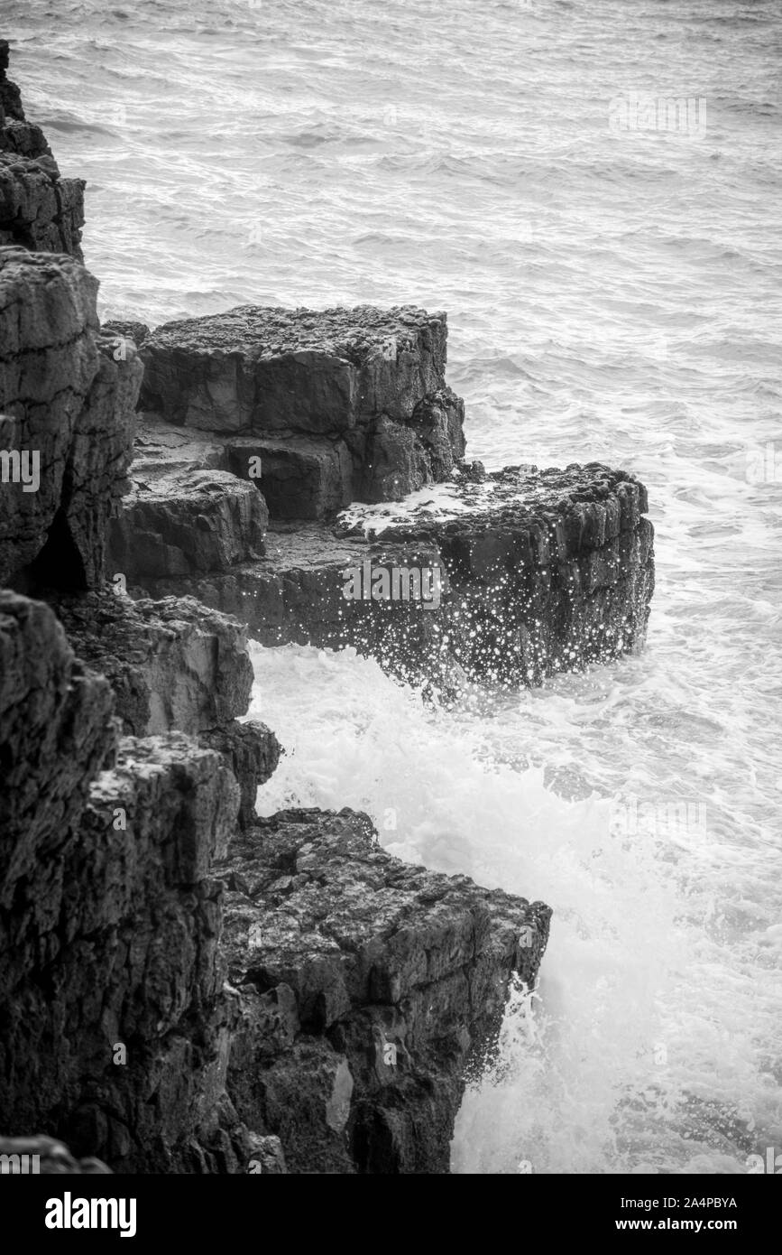 Rocky shoreline sea in Black and White Stock Photos & Images - Alamy