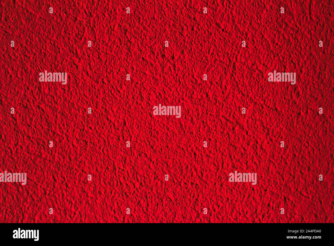 Bright red wall texture for background or wallpaper Stock Photo