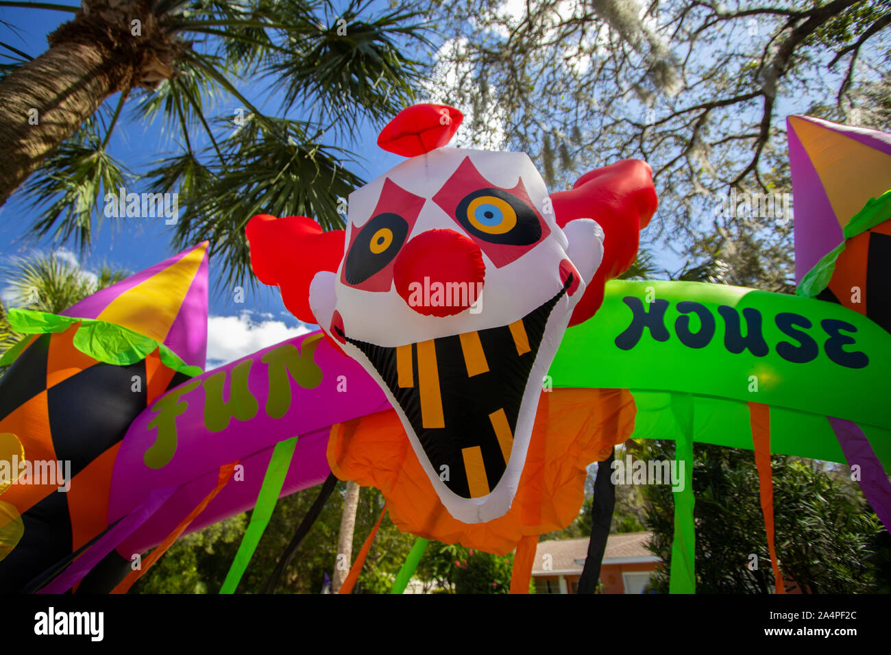 Halloween Fun House decoration with a scary clown Stock Photo