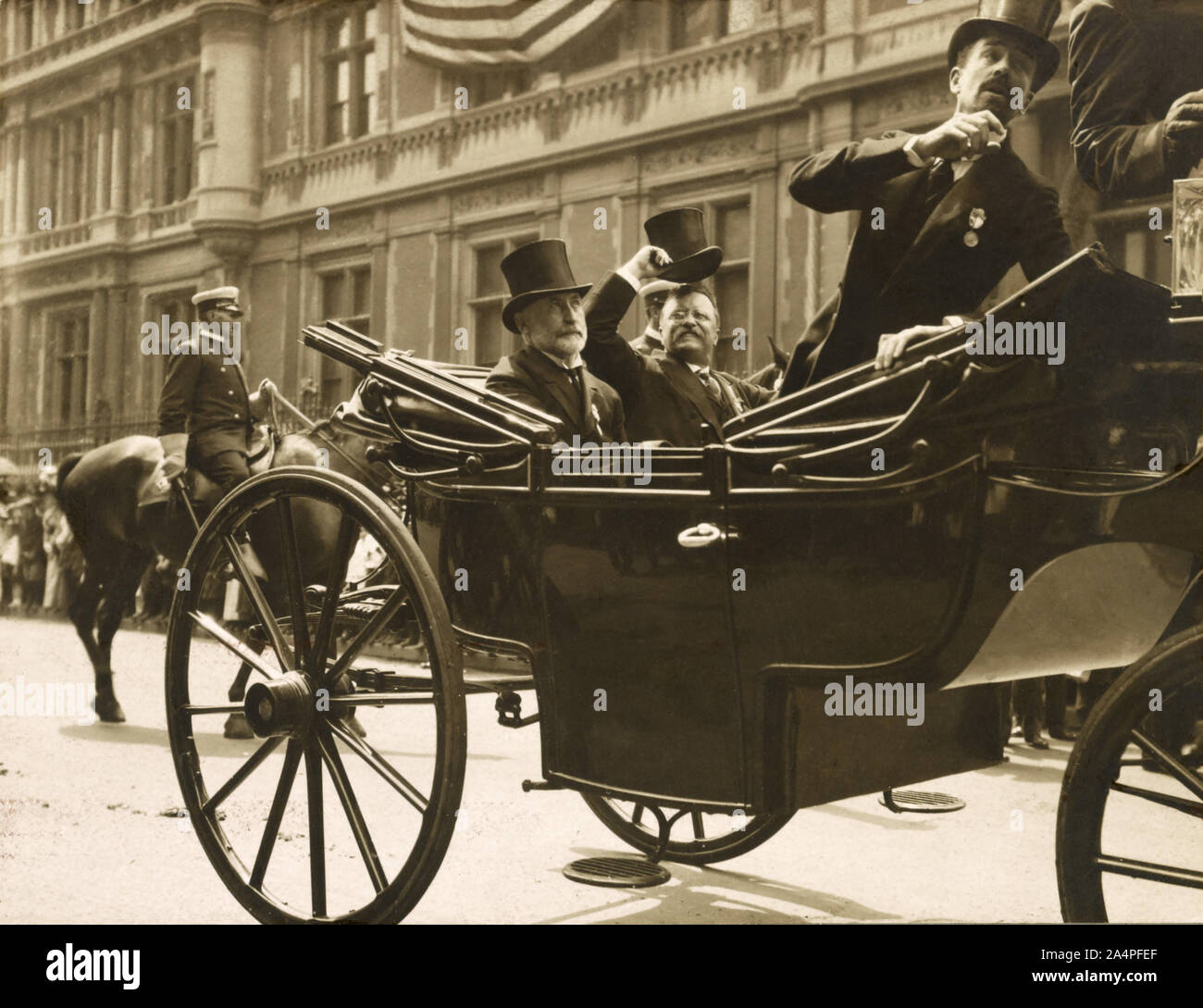 Theodore Roosevelt riding in open Carriage with New York City Mayor William Gaynor and Cornelius Vanderbilt during his Homecoming Reception after his trip Abroad, New York City, New York, USA, 1910 Stock Photo